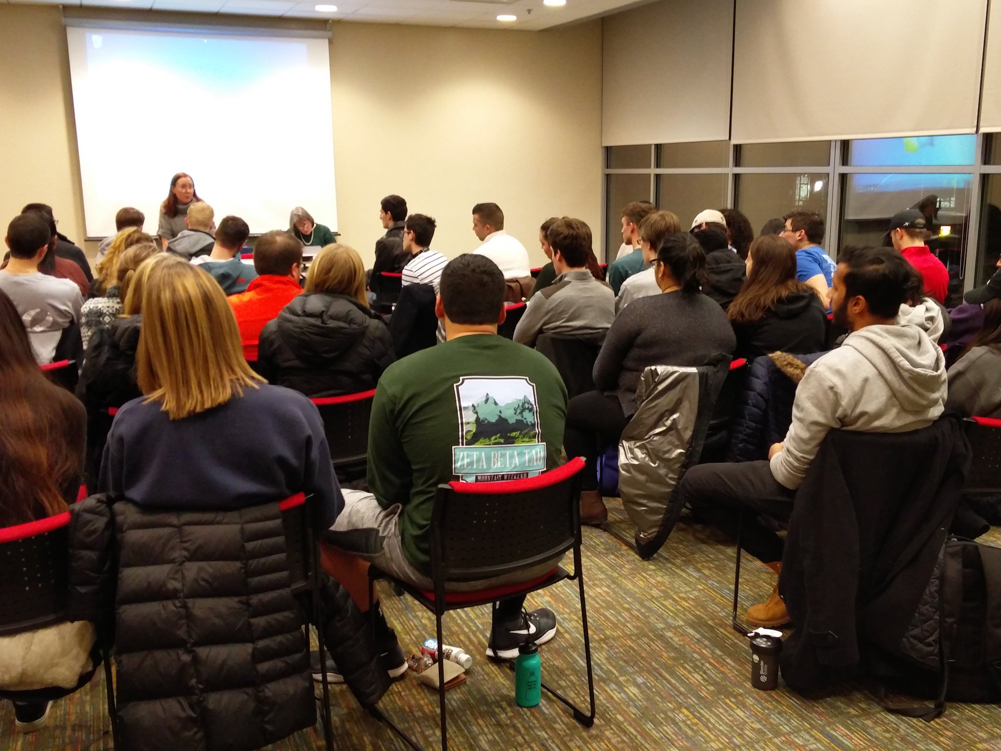 The UConn Undergraduate Student Government met Wednesday, Feb. 8 with a heavy agenda to get through. They passed a bill that would begin providing free tampons and pads in female and gender-neutral bathrooms on campus. (Jason Jiang/The Daily Campus)