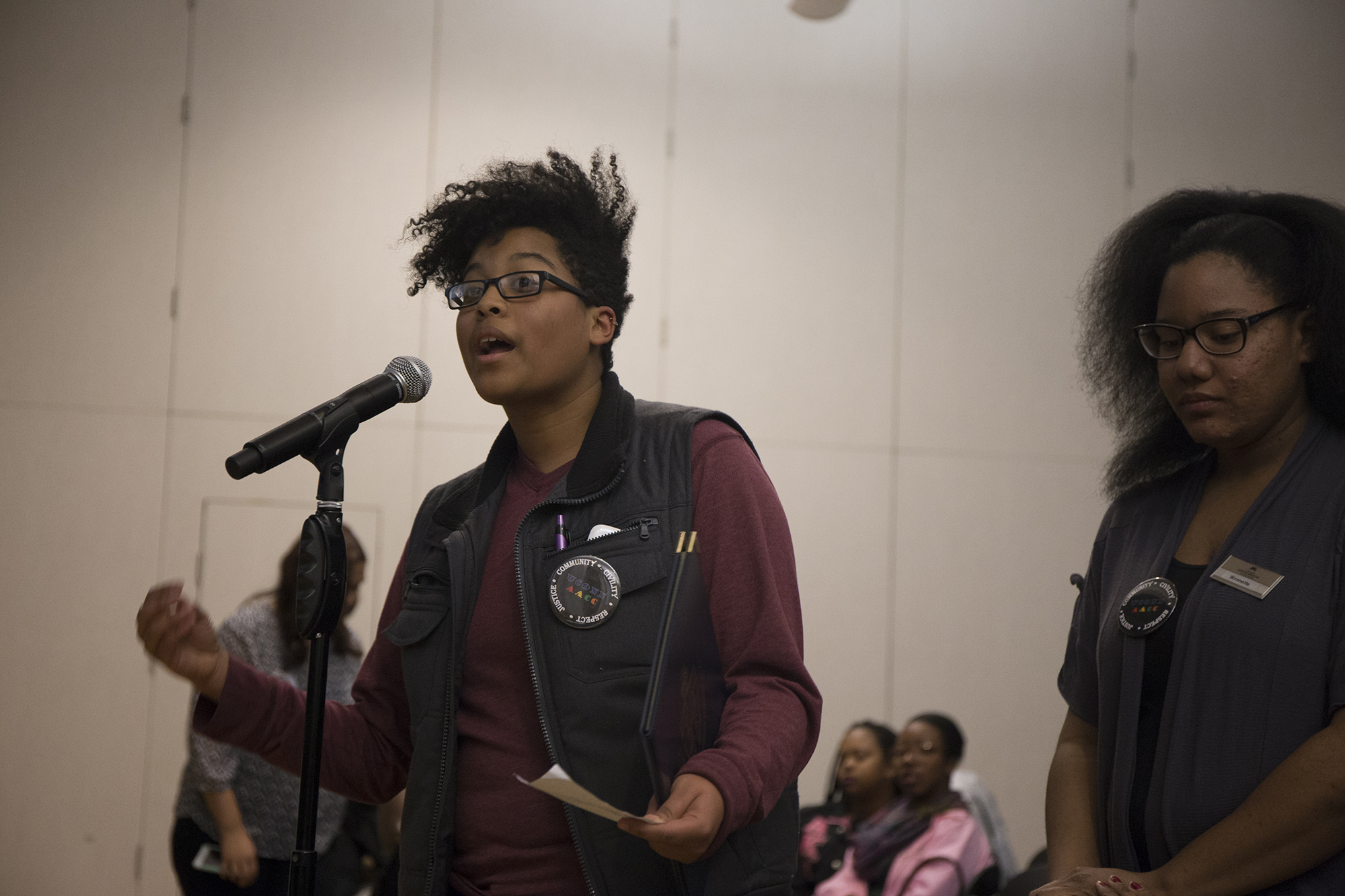UConn graduate student Chriss Sneed, left, speaks to the panel at the Cultural Center Town Hall on November 10, 2014. Chriss Sneed resigned last week from the UConn Graduate Student Senate. (File Photo/ The Daily Campus)