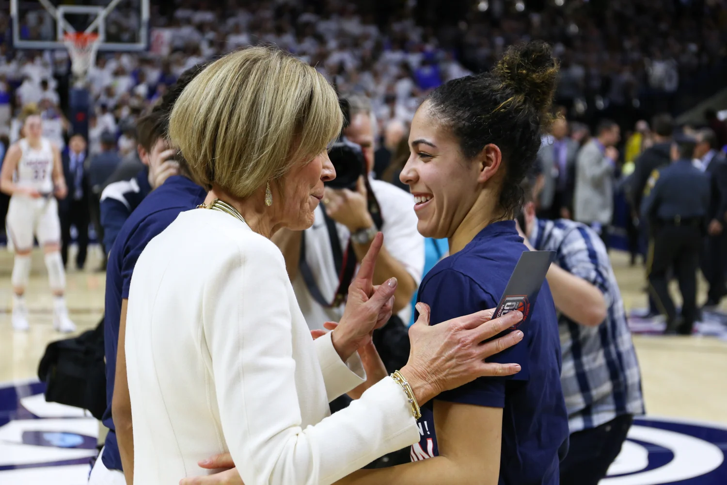 Kia Nurse (right) and Chris Dailey share a laugh after the game. (Jackson Haigis/The Daily Campus)