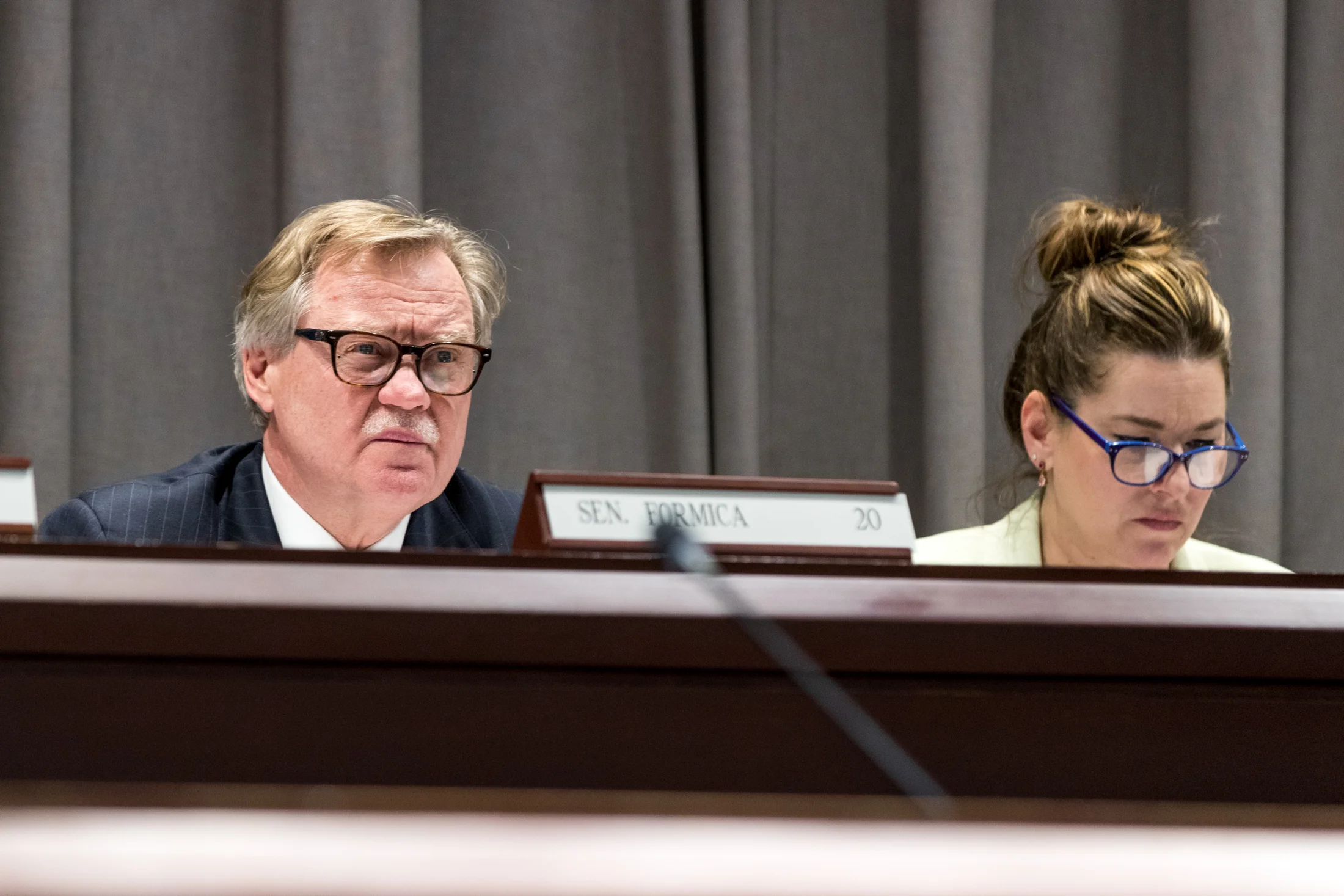 Senators Paul Formica and Mae Flexer listen to testimony from USG members regarding state budget cuts directed at UConn on Wednesday afternoon.
