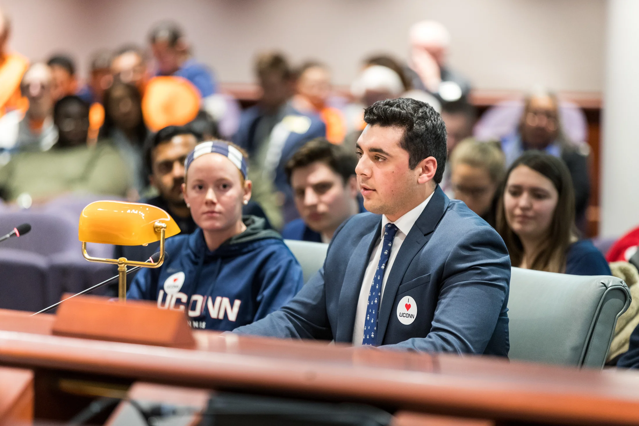 USG member Humza Mirza speaks to the state Appropriations Committee in order to convince them not to cut funding toward the university on Wednesday, Feb. 15.
