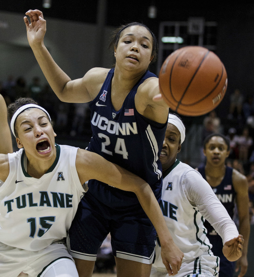 Tulane guard Tene Thompson (15) blocks Connecticut guard/forward Napheesa Collier (24) during the second half of an NCAA college basketball game in New Orleans, Saturday, Feb. 18, 2017. (AP Photo/Sophia Germer)
