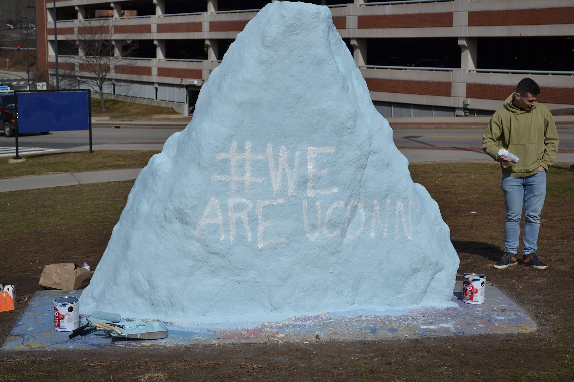 On the morning of Monday, February 27, the spirit rock near North Garage was painted with "Frat Lives Matter." Other fraternity members were quick to repaint the rock with the hashtag #WeAreUConn. (Olivia Stenger/ The Daily Campus)