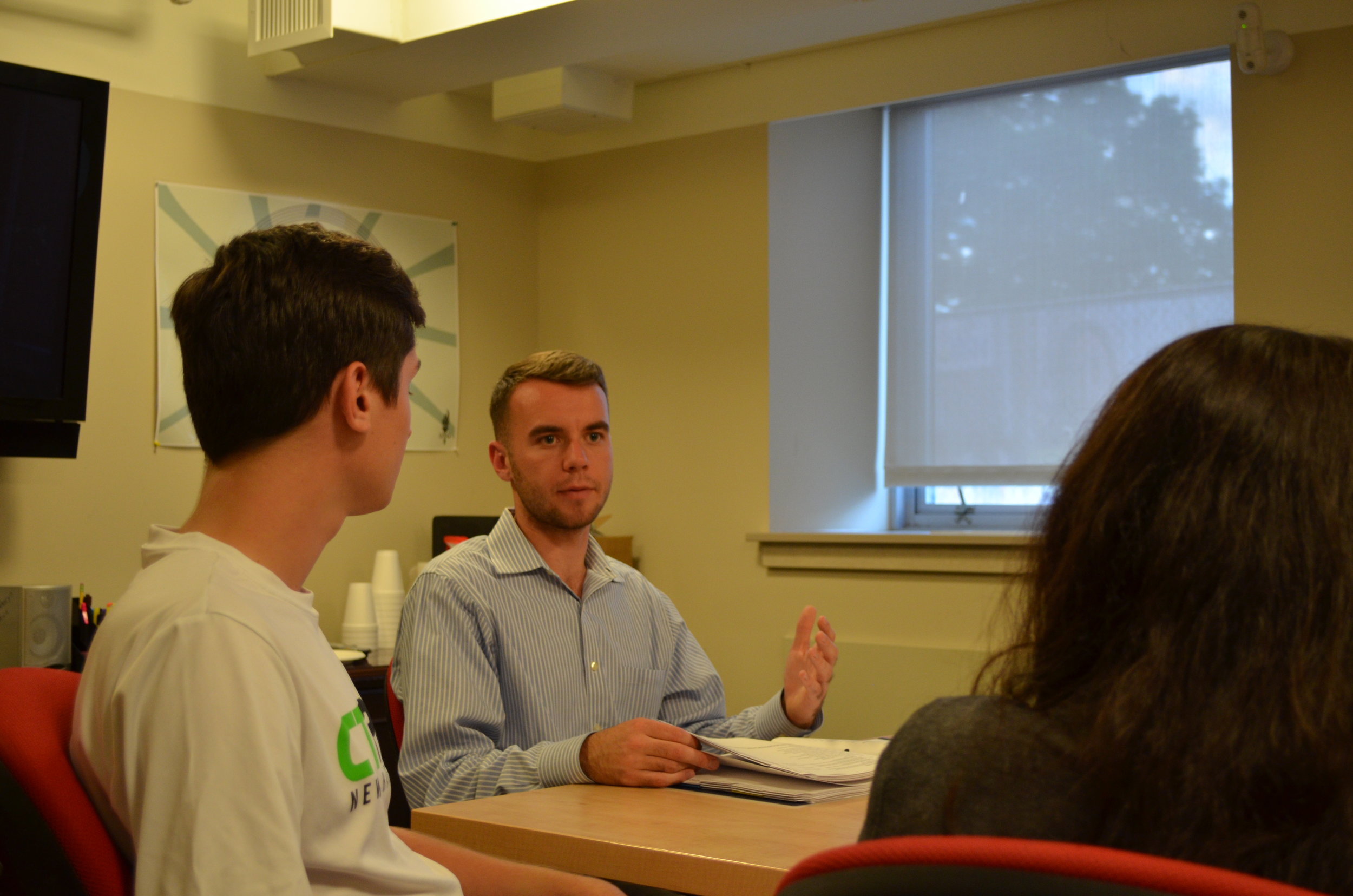 Senior political science major Adam Kuegler, who is an undergraduate student representative on the Board of Trustees, meets with other UConn students from the regional campuses. (Akshara Thejaswi/The Daily Campus)