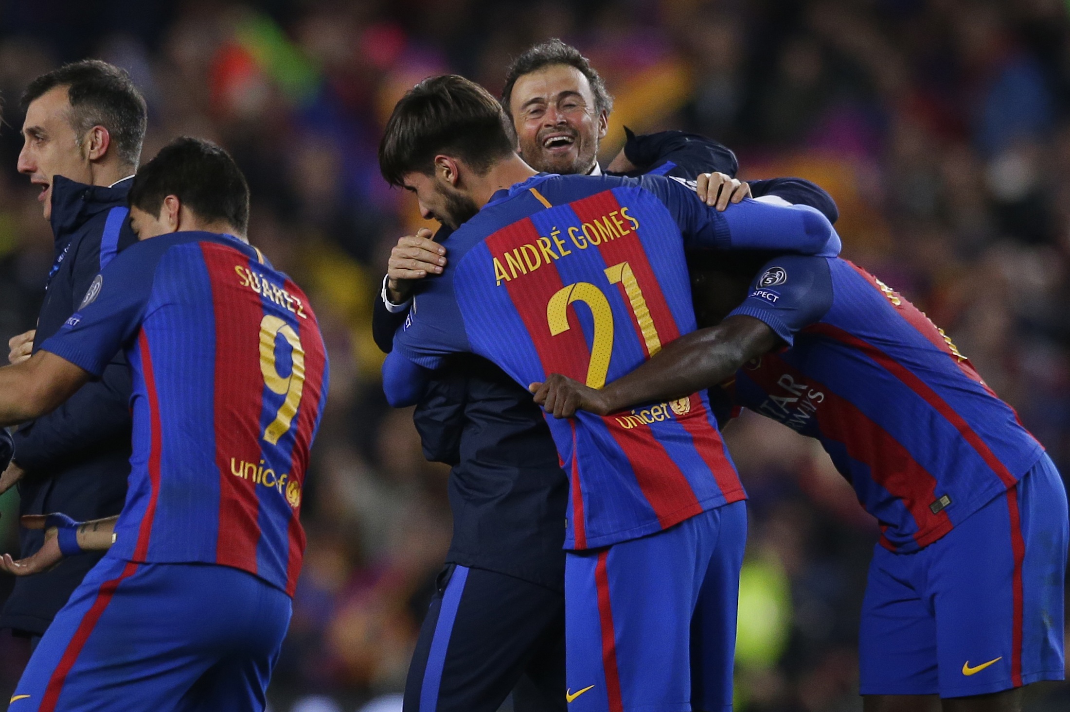 Barcelona's head coach Luis Enrique celebrates with some of his players at the end of the Champions League round of 16, second leg soccer match between FC Barcelona and Paris Saint Germain at the Camp Nou stadium inBarcelona, Spain, Wednesday March 8, 2017. Barcelona won the match 6-1 (6-5 on aggregate). (Manu Fernandez/AP)