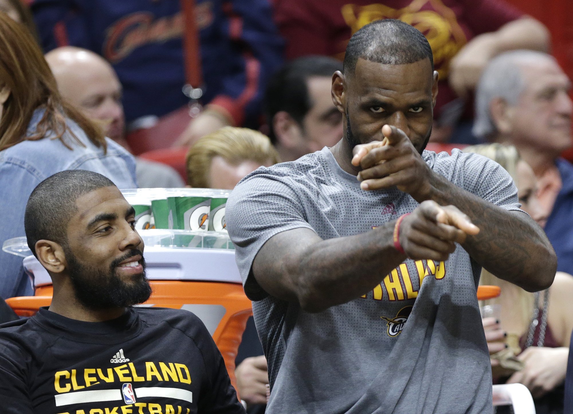 Cleveland Cavaliers' LeBron James, right, gestures as he sits with Kyrie Irving, left, on the bench during the first half of an NBA basketball game against the Miami Heat, Saturday, March 4, 2017, in Miami. (Lynne Sladky/AP)
