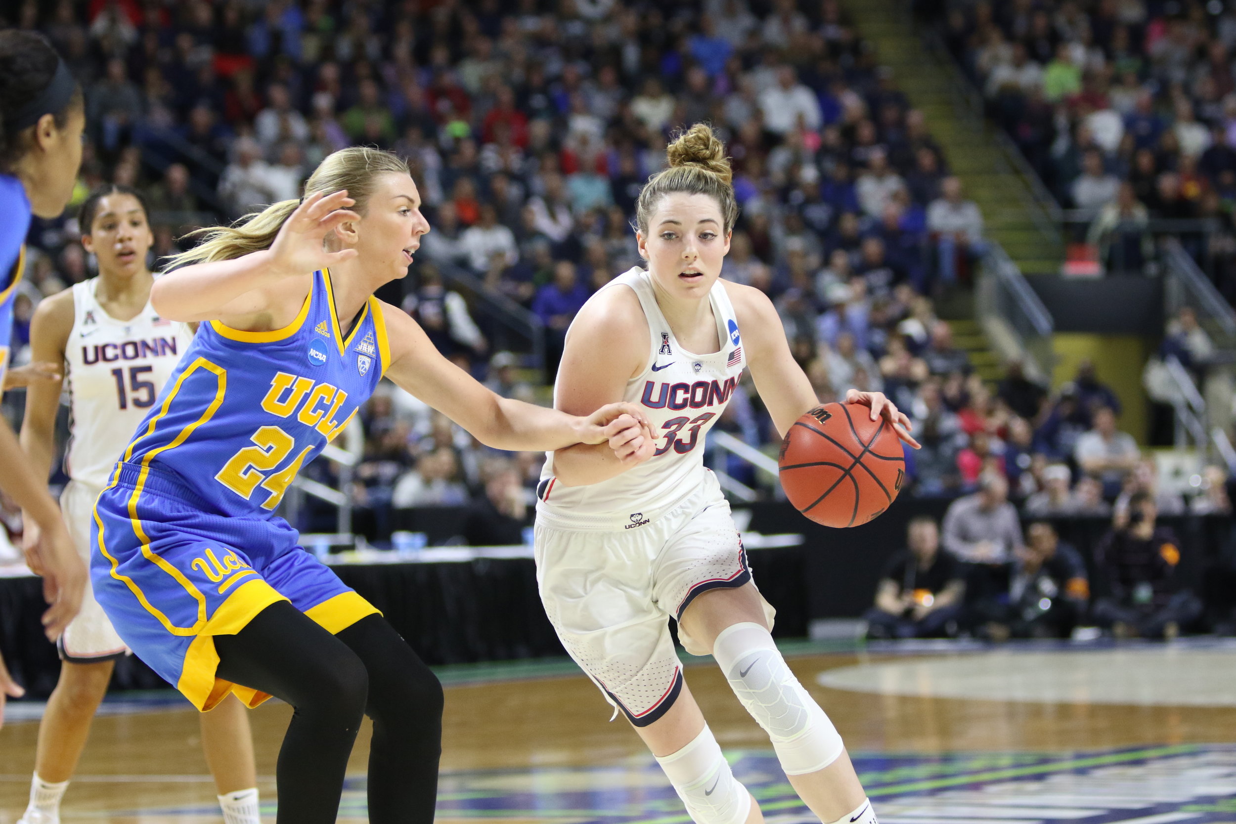 UConn's Katie Lou Samuelson drives to the paint against UCLA's Paulina Hersler during Saturday's win. The UConn women's basketball team advanced to their 12th straight Elite 8 with an 86-71 win over No. 4 UCLA on Saturday afternoon at Webster Bank Arena in Bridgeport. (Jackson Haigis/The Daily Campus)