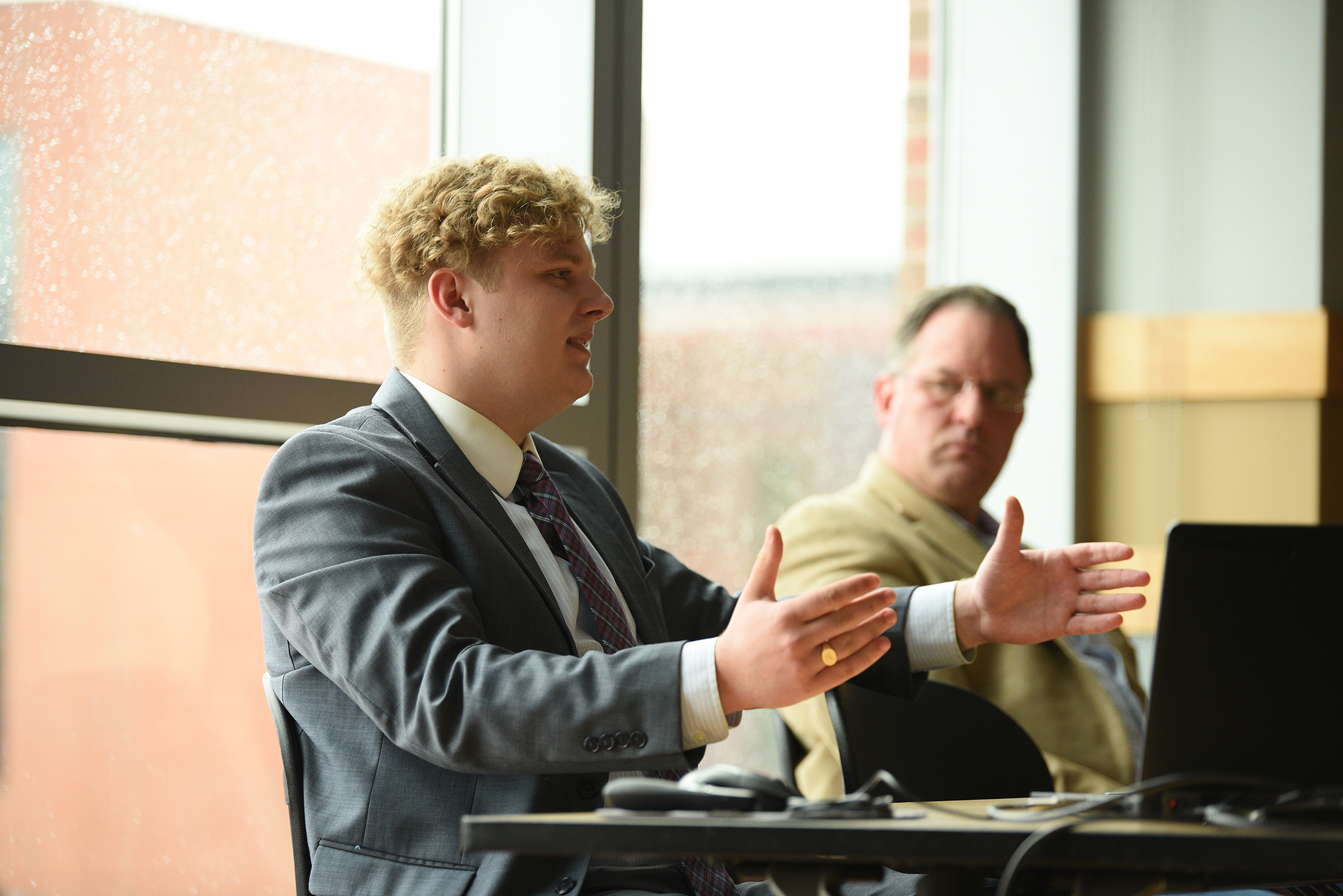 Former Army service member and current UConn student, Michael Bidwell, and Navy Veteran Bob Hunter, boldly share their stories and discuss the effects of military sexual trauma. (Zhelun Lang/The Daily Campus)