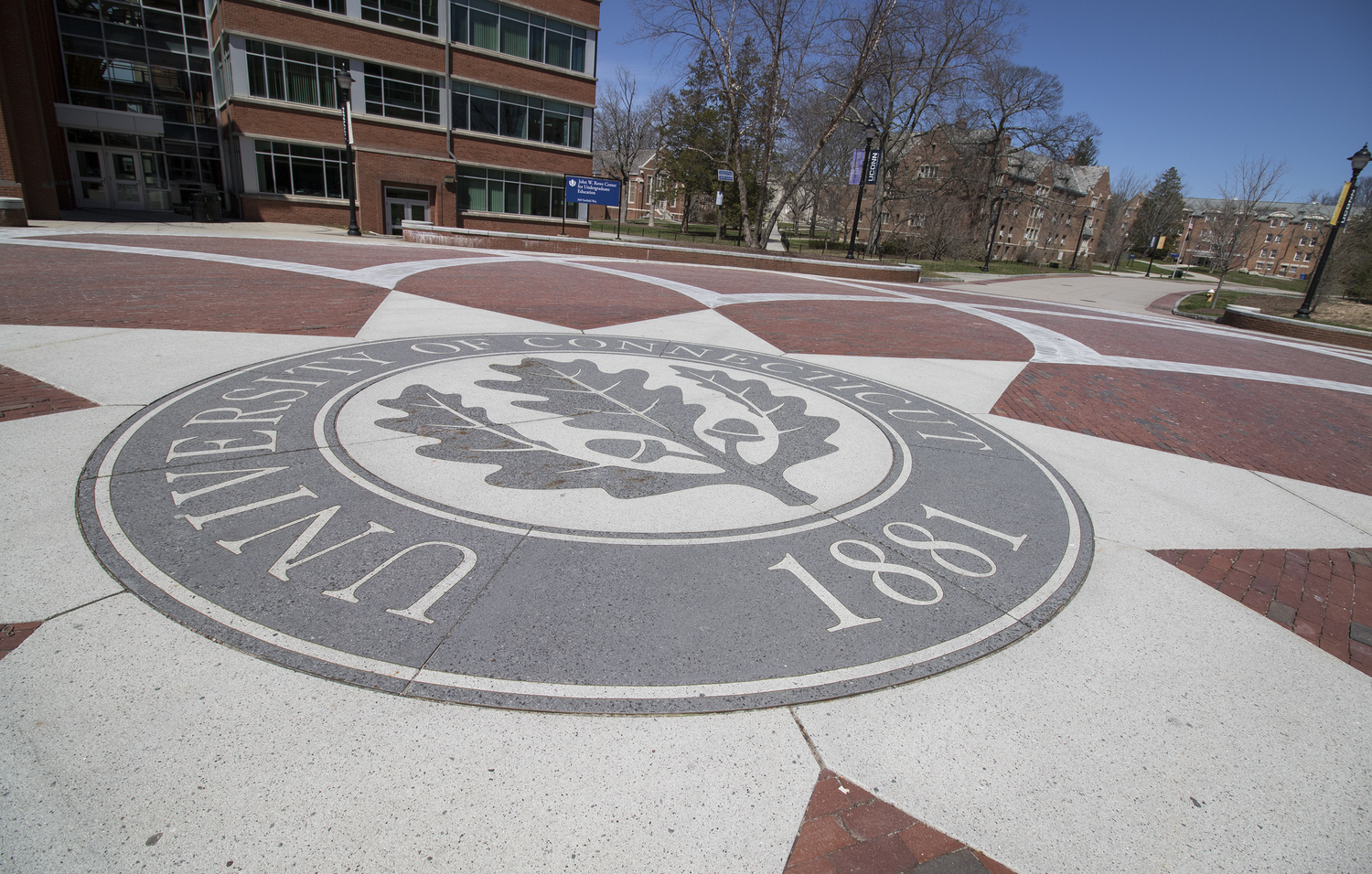 The UConn seal on Fairfield Way between the Homer Babbidge Library and the Rowe Center for Undergraduate Education in Storrs, Connecticut. (Jackson Mitchell/The Daily Campus)