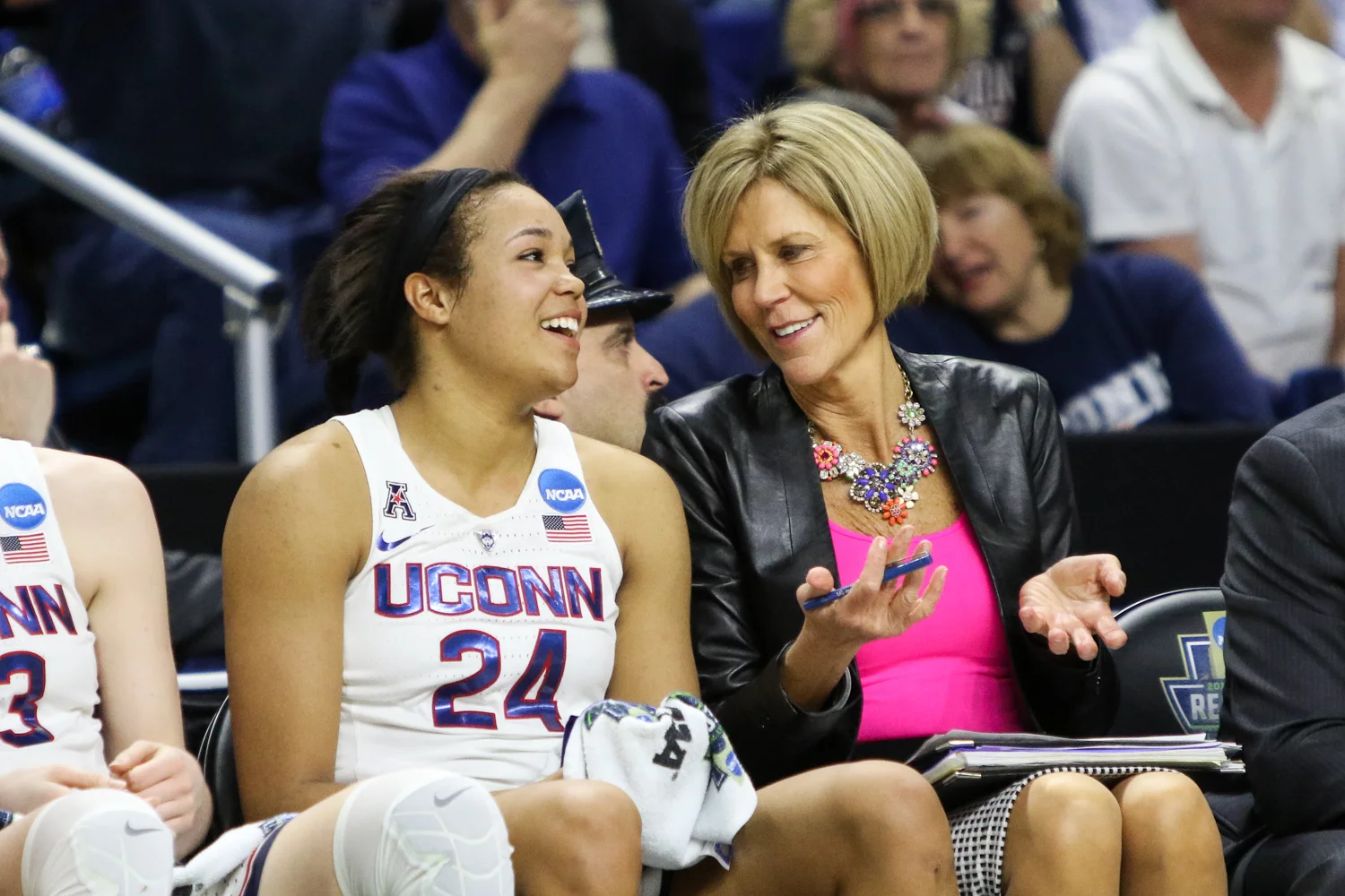 UConn’s Napheesa Collier and assistant coach Chris Dailey share a laugh in the fourth quarter of the Huskies’ win.