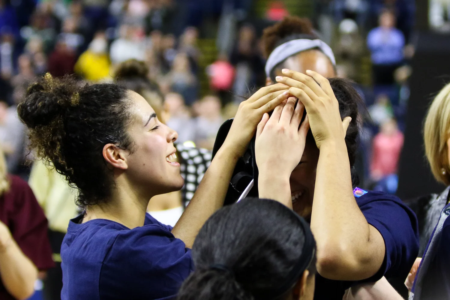 UConn’s Napheesa Collier is mobbed by her teammates after she was announced as the Most Outstanding Player of the Bridgeport Regional.