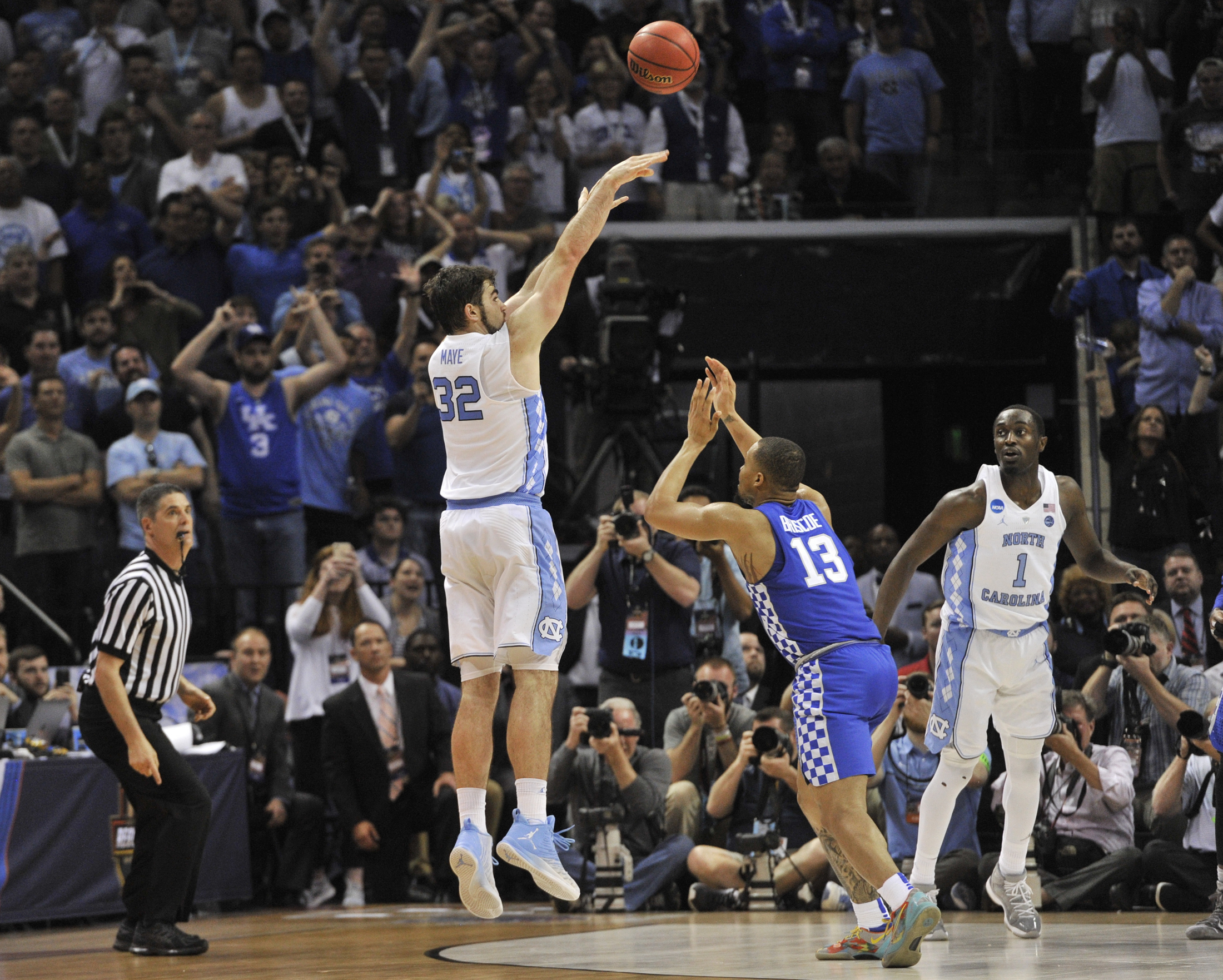 North Carolina forward Luke Maye (32) shoots the winning basket as Kentucky guard Isaiah Briscoe (13) defends in the second half of the South Regional final game in the NCAA college basketball tournament Sunday, March 26, 2017, in Memphis, TN. (Brandon Dill/AP)