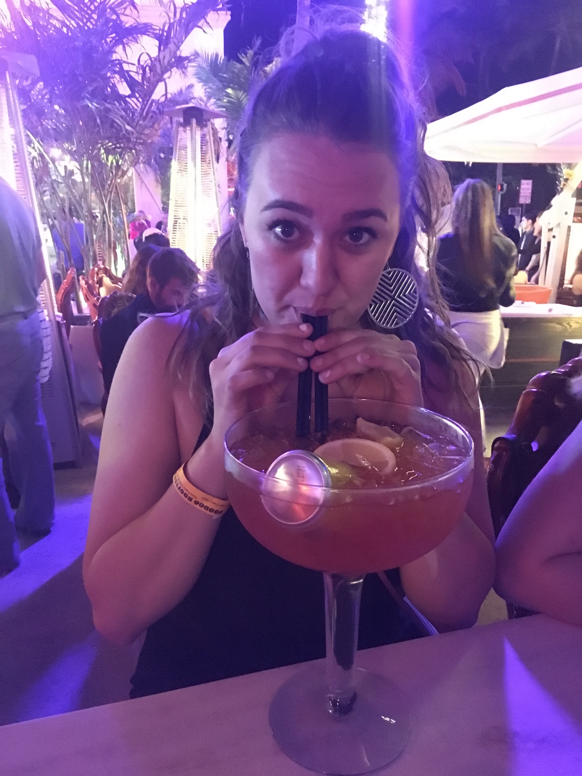 The last photo of the author just moments before she dropped her phone in a Miami bar. She was blissfully unaware of the second vacation her first vacation would create by losing her phone for a week. Photo courtesy of author.