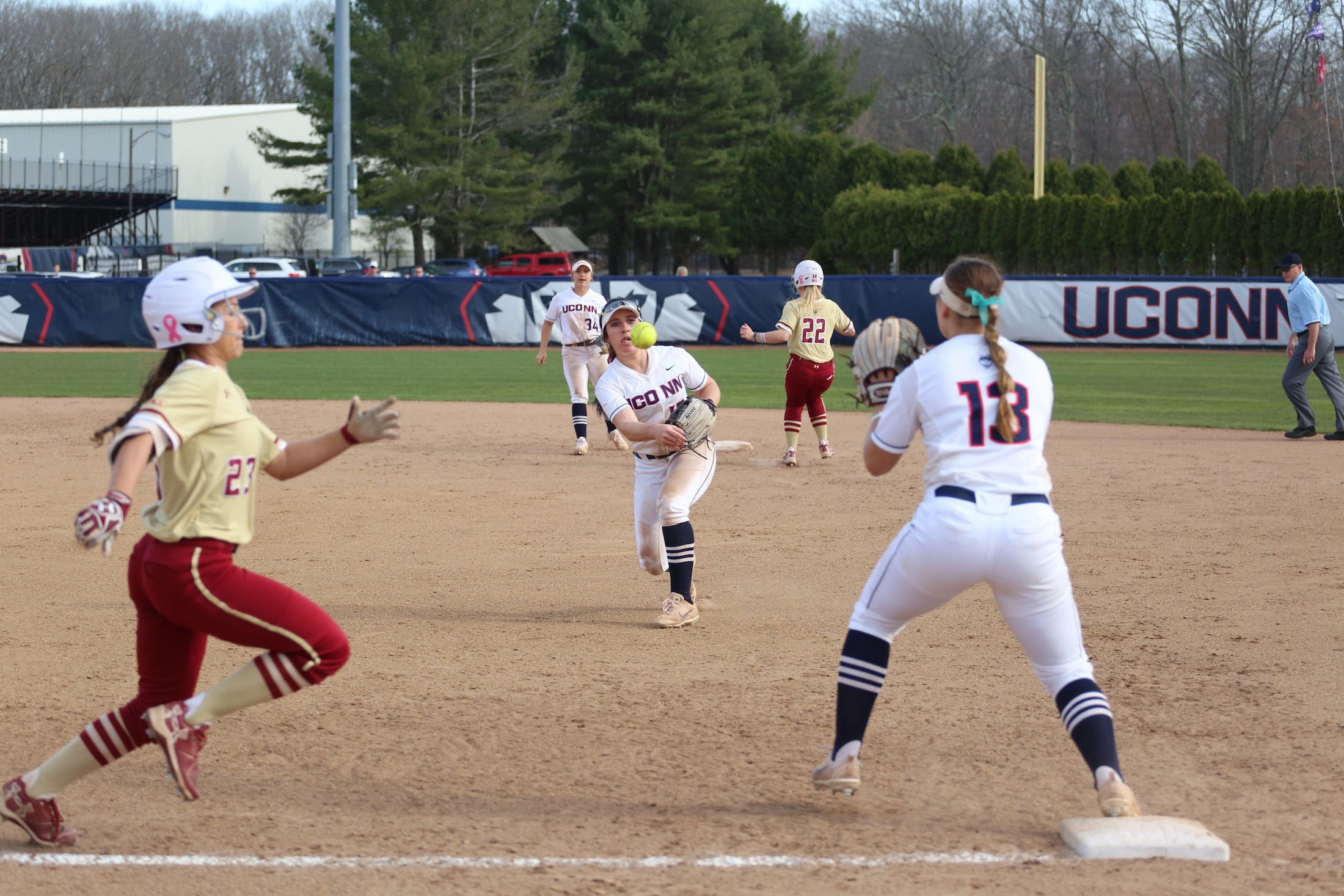 Carli Cutler goes in for a catch to strike out Boston College's batter in Tuesday's game at UConn. The Huskies won with a score of 3-2. (Tyler Benton/The Daily Campus)