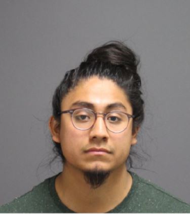 Eric Cruz-Lopez was arrested on May 7th on over 100 accounts of vandalism, with many of the cases including anti-Trump graffiti in the Homer Babbidge Library, the Student Union, the Northwest Dining Hall and other locations around UConn, according to the arrest warrant from the UConn Police Department.(Courtesy/UCPD)