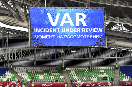 A giant screen reports a VAR incident is being reviewed during the Confederations Cup, Group A soccer match between Portugal and Mexico, at the Kazan Arena, Russia, Sunday, June 18, 2017. (Martin Meissner/AP)