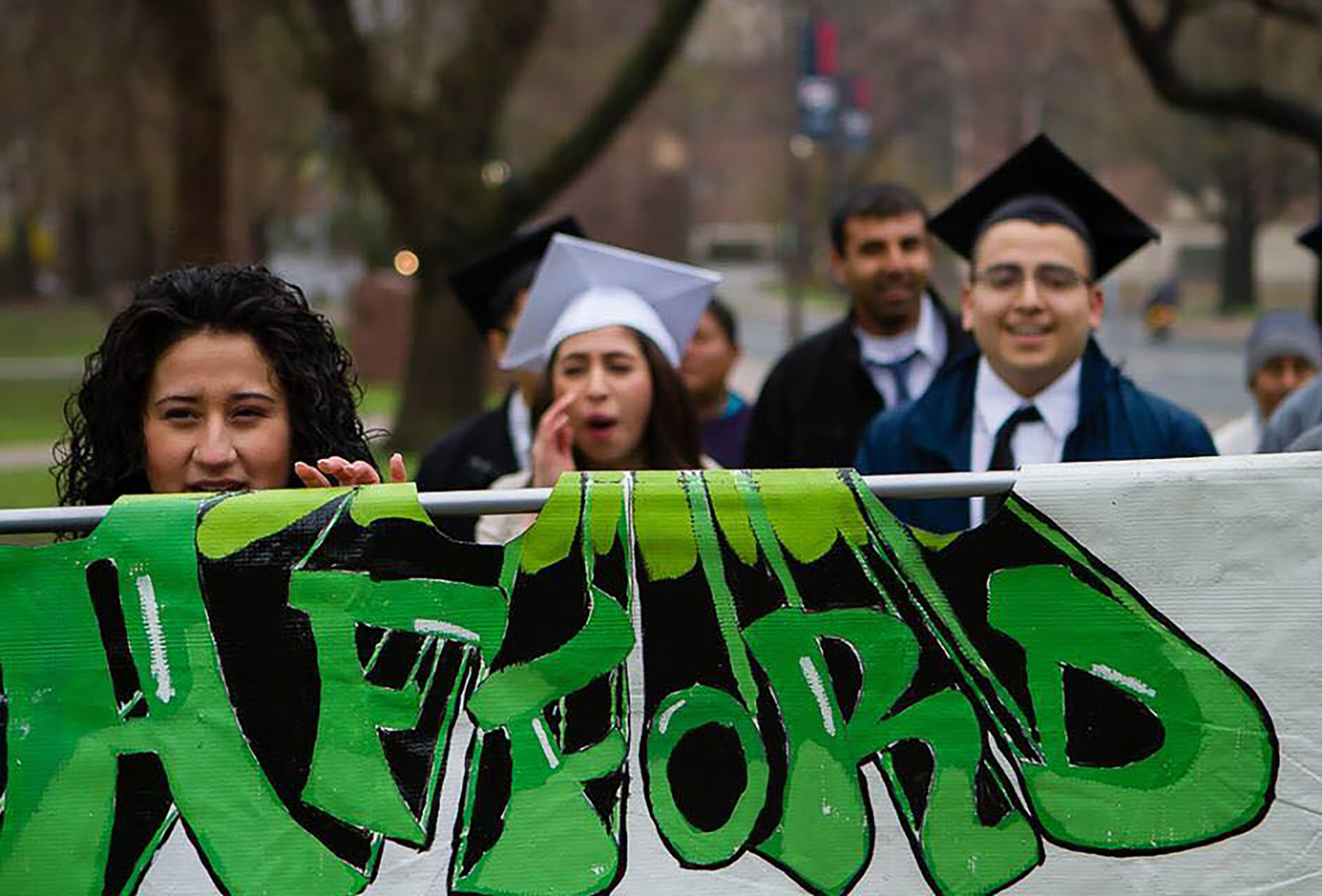 Alison Martinez-Carrasco (middle) walks in front of the Connecticut State Capitol in Hartford, Connecticut during a rally supporting the Afford to Dream campaign in 2014. (Courtesy/Morty Ortega)