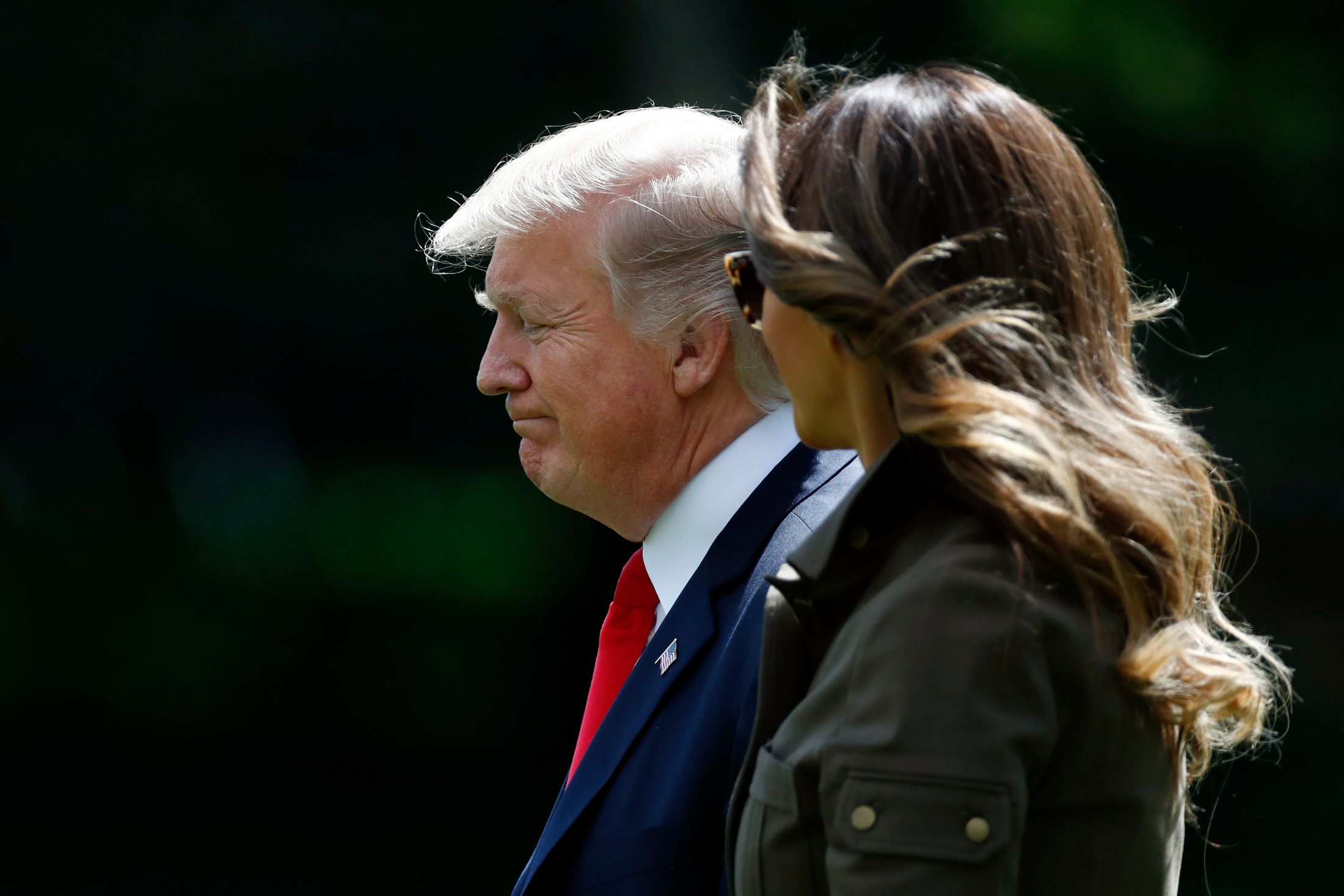 President Donald Trump and first lady Melania Trump walk from the Oval Office of the White House in Washington, Friday, Sept. 15, 2017, to Marine One for the short trip to Andrews Air Force Base, Md.. (AP Photo/Carolyn Kaster)