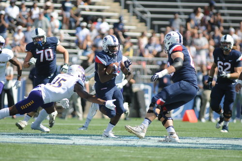 Arkeel Newsome cuts through the ECU defense in Sunday's loss. (Jon Sammis/The Daily Campus)