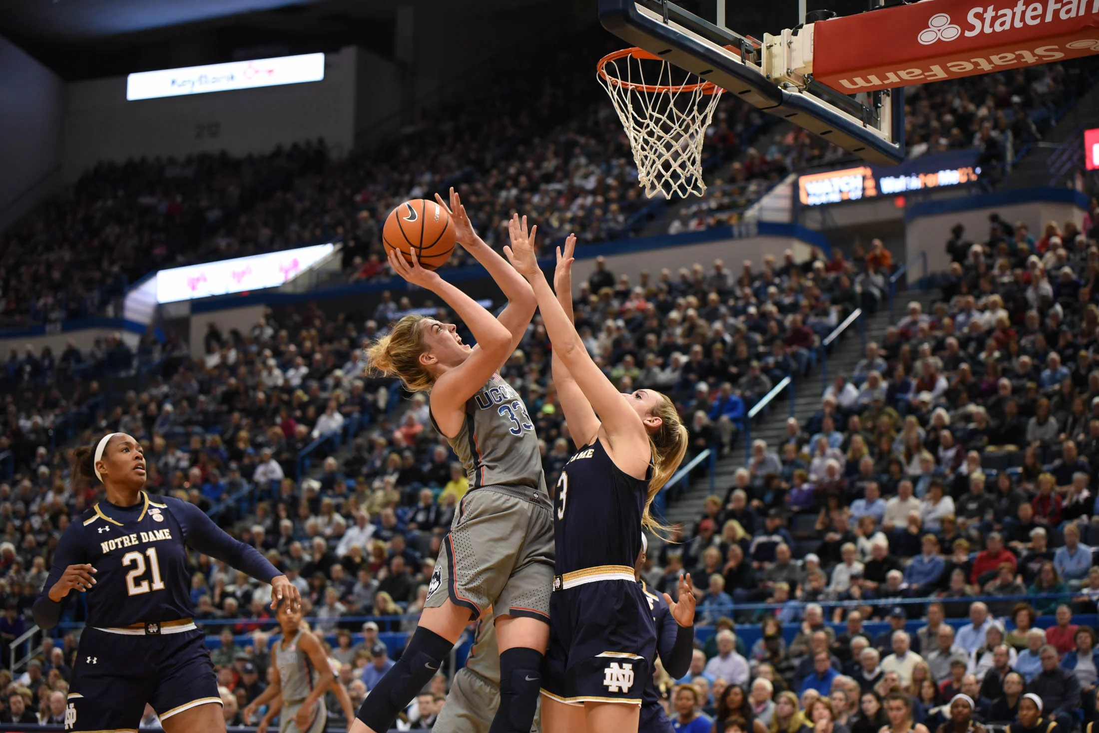 Katie Lou Samuelson fights for a layup ending the game with 18 points. (Charlotte Lao/The Daily Campus)