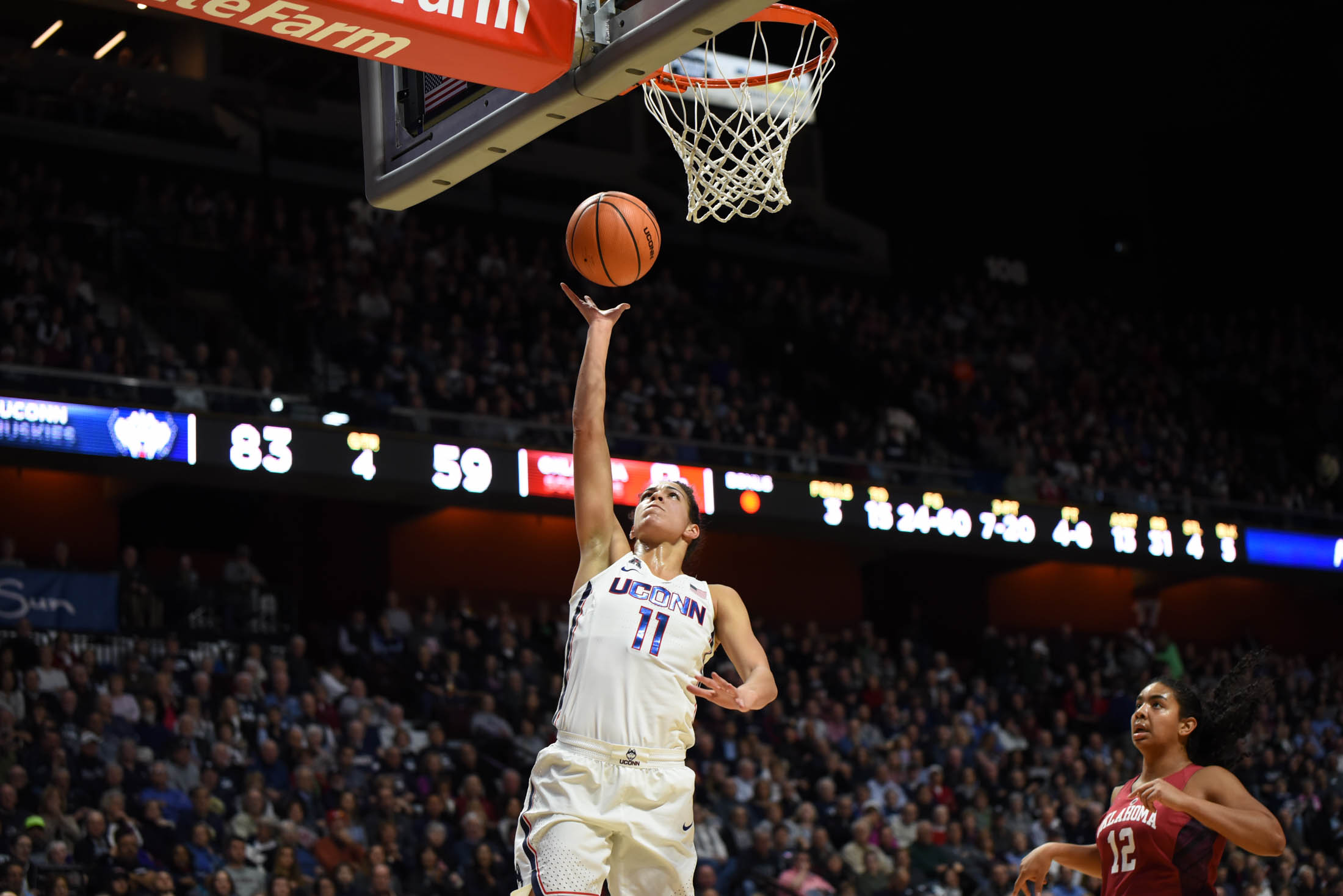 Kia Nurse puts up a layup to finish the game with 17 points. (Charlotte Lao/The Daily Campus)