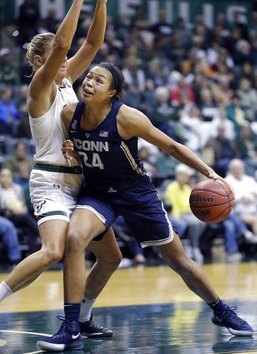 South Florida forward Maria Jespersen blocks the lane as Connecticut forward Napheesa Collier (24) tries to go to the basket during the third quarter of an NCAA college basketball game Saturday, Jan. 6, 2018, in Tampa, Fla. UConn won 100-49. (AP Photo/Chris O'Meara)