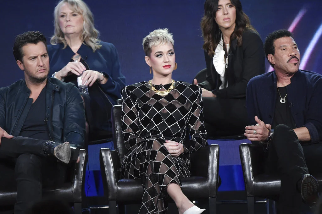 Luke Bryan, from left, Katy Perry and Lionel Richie participate in the "American Idol" panel during the Disney/ABC Television Critics Association Winter Press Tour on Monday, Jan. 8, 2018, in Pasadena, Calif. (Photo by Richard Shotwell/Invision/AP)