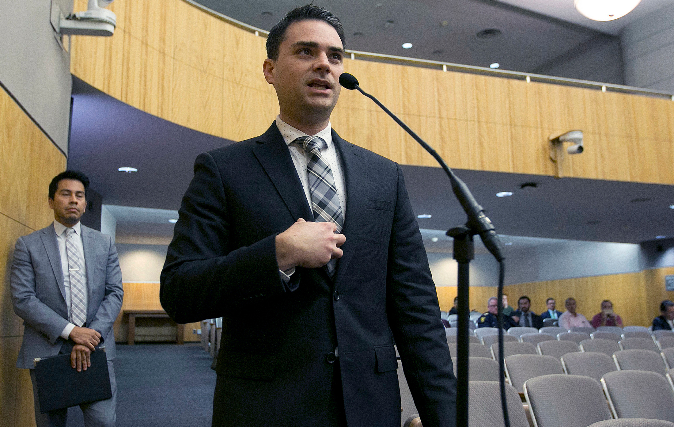 In this Oct. 3, 2017 photo, conservative writer Ben Shapiro speaks during the first of several legislative hearings planned to discuss balancing free speech and public safety in Sacramento, Calif. A University of Connecticut Republican student group has invited Shapiro to speak on Jan. 24, 2018, on campus in Storrs, Conn. (AP Photo/Rich Pedroncelli, File)