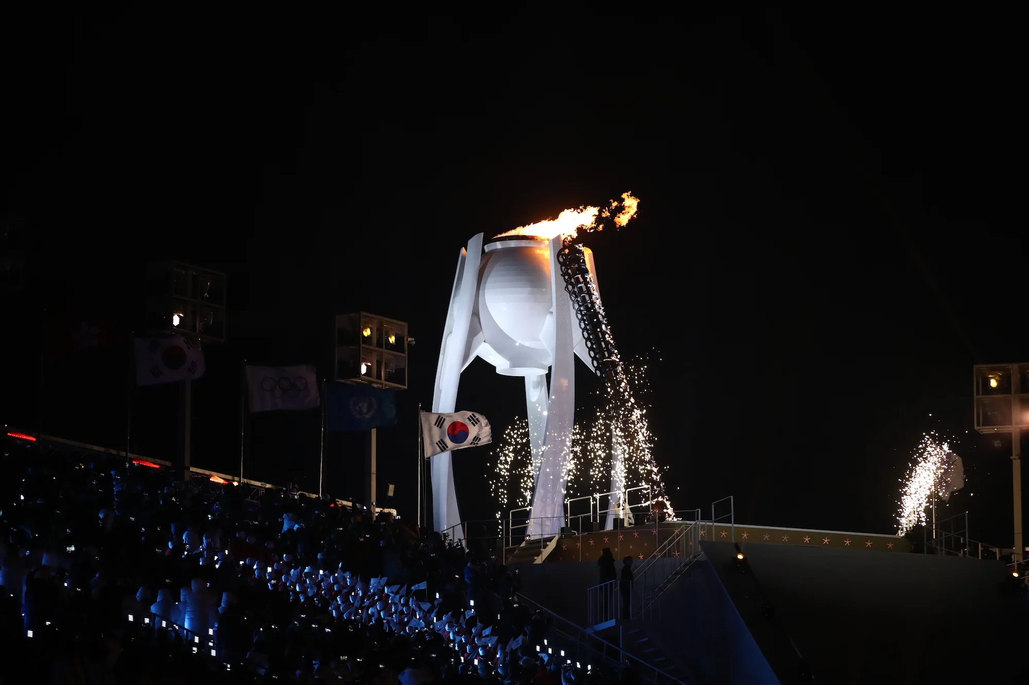 The Olympic flame is lit during the opening ceremony of the 2018 Winter Olympics in Pyeongchang, South Korea, Friday, Feb. 9, 2018. (Clive Mason/Pool Photo via AP)