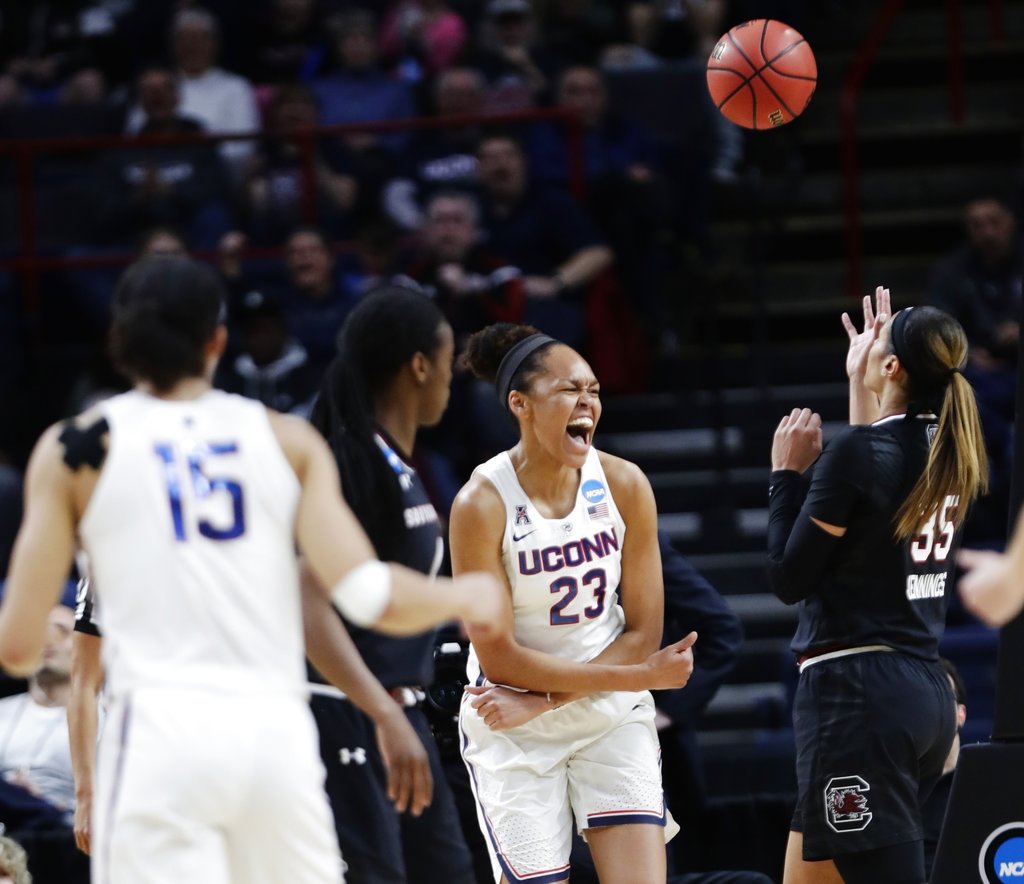 Connecticut's Azura Stevens (23) celebrates after scoring during the first half of a regional final against South Carolina at the a women's NCAA college basketball tournament Monday, March 26, 2018, in Albany, N.Y. (AP Photo/Frank Franklin II)