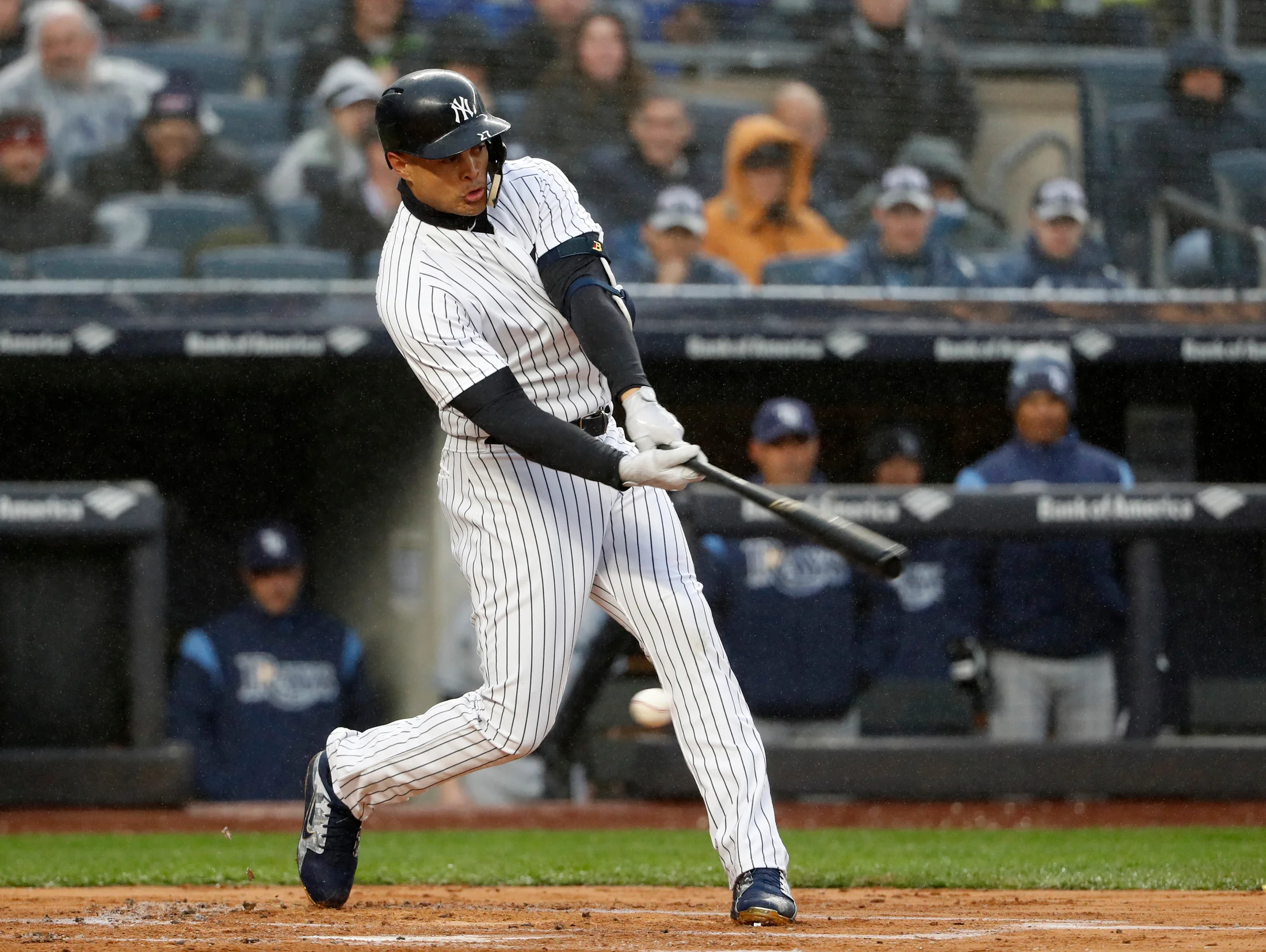 New York Yankees Giancarlo Stanton strikes out swinging in his first at-bat in the first inning of an opening day baseball game against the Tampa Bay Rays at Yankee Stadium in New York, Tuesday, April 3, 2018. (AP Photo/Kathy Willens)
