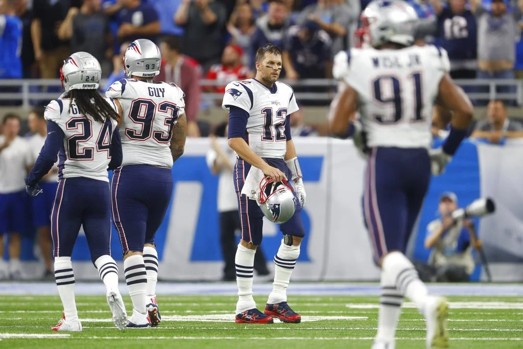 New England Patriots quarterback Tom Brady walks off the field during the second half of an NFL football game against the Detroit Lions, Sunday, Sept. 23, 2018, in Detroit. (AP Photo/Paul Sancya)