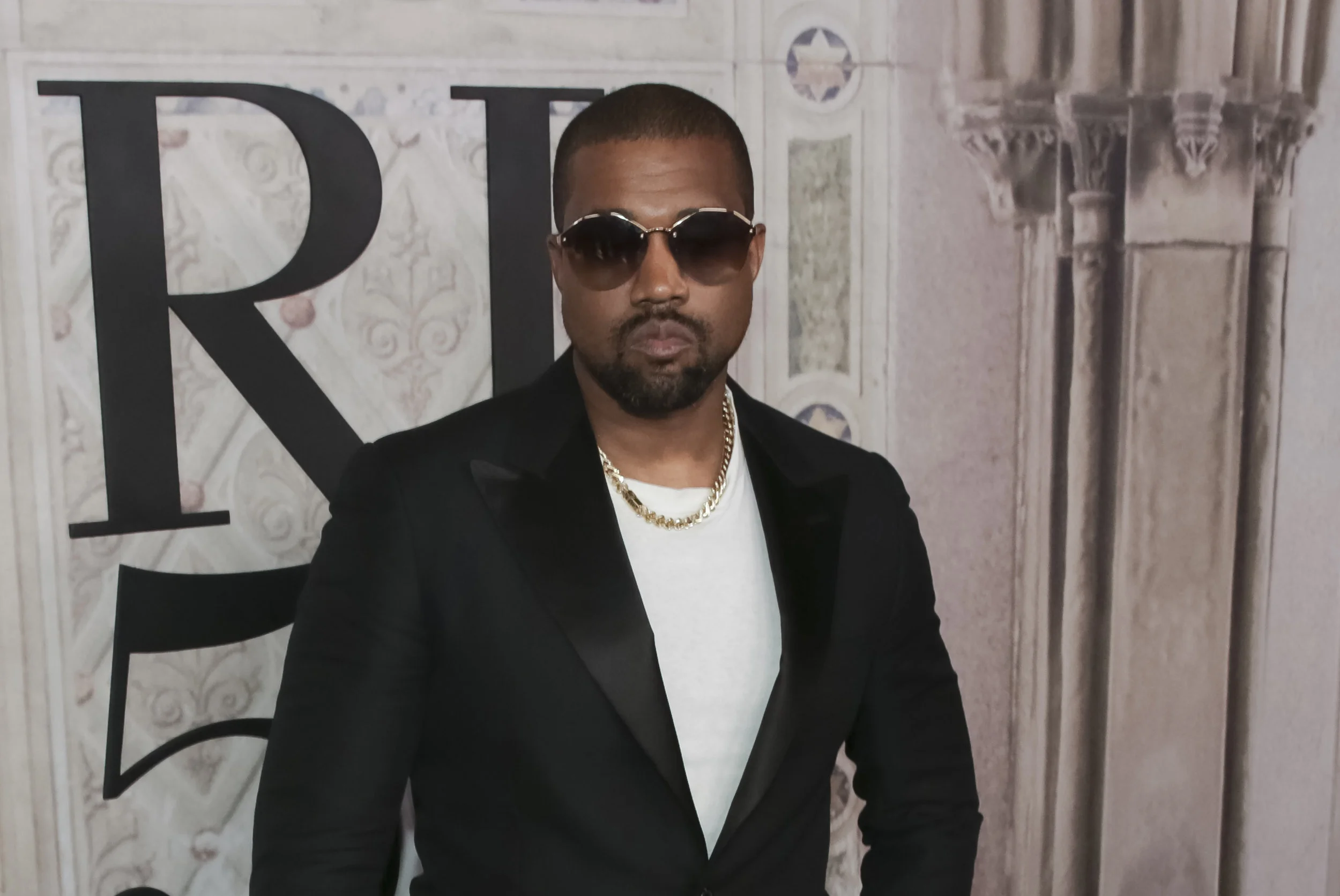 In this Sept. 7 file photo, Kanye West attends the Ralph Lauren 50th Anniversary Event in Central Park during New York Fashion Week. President Donald Trump has panned Saturday Night Live's season premiere but tweeted praise for Kanye West. As the show ended, West took the stage wearing a "Make America Great Again" hat and made an unscripted pro-Trump speech after the credits rolled. (Brent N. Clarke/AP, File)