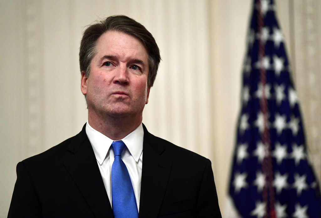 Supreme Court Justice Brett Kavanaugh stands before a ceremonial swearing-in in the East Room of the White House in Washington, Monday, Oct. 8, 2018. (AP Photo/Susan Walsh)