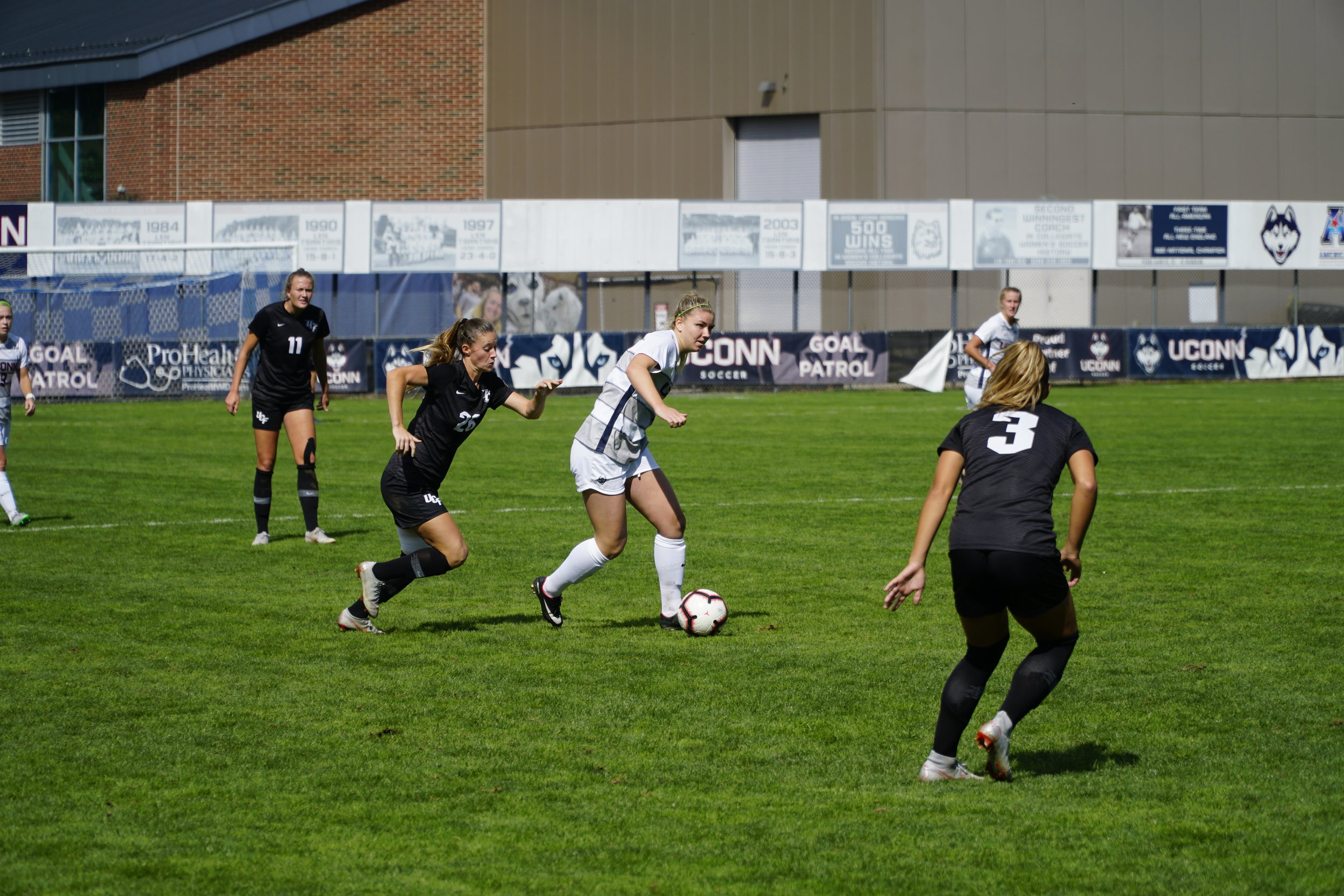 UConn Women’s Soccer’s Kim Urbanek maintains control of the ball during a game against UCF on Sept. 30, 2018. (Nicholas Hampton/ The Daily Campus)