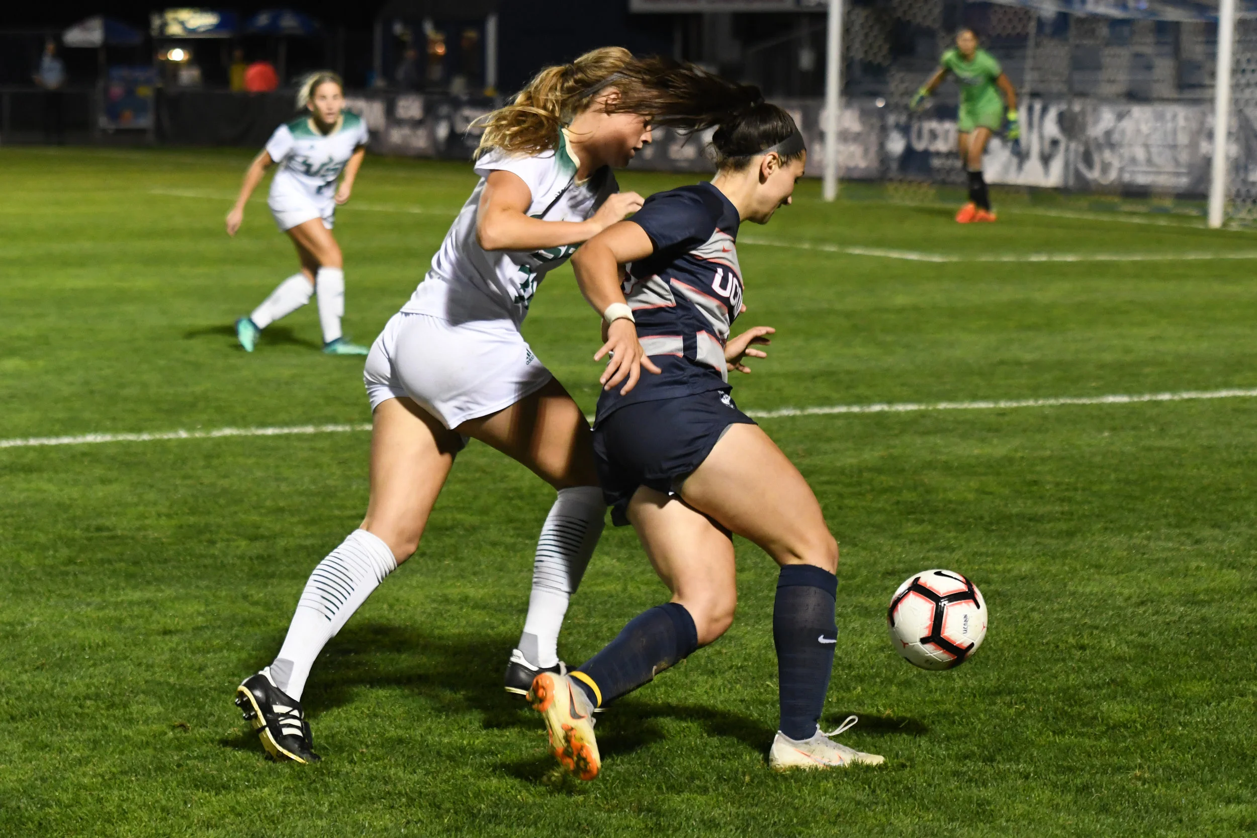 Sophia Danyko-Kulchycky fights off a South Florida defender during a game on Thursday, Sept. 27 at Morrone Stadium. (Nicholas Hampton, Associate Photo Editor/The Daily Campus)