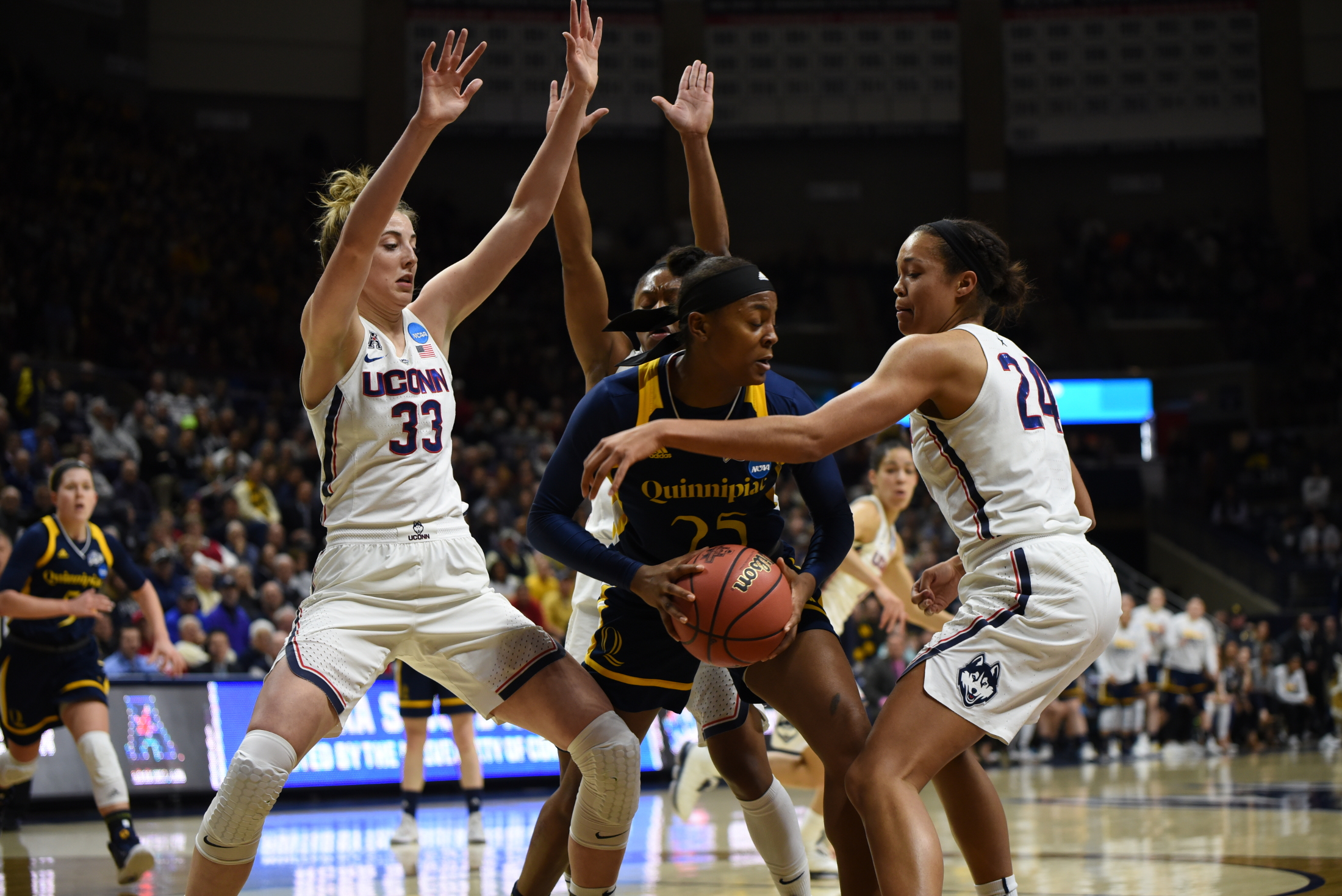 In an in-state battle against Quinnipiac for the second round of the NCAA Tournament, then juniors Napheesa Collier and Katie Lou Samuelson lock up on defense (Charlotte Lao/The Daily Campus)