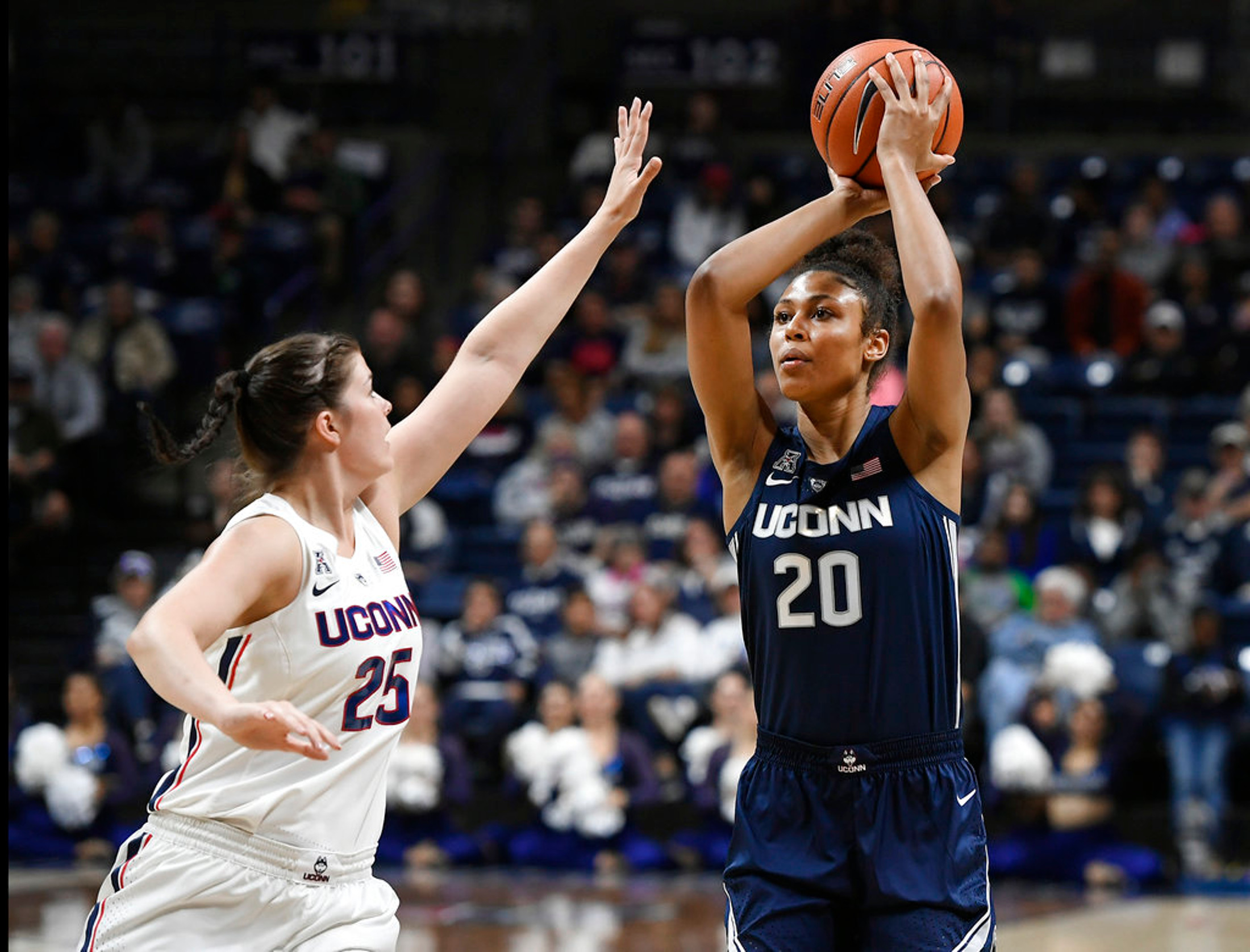 FILE - In this Friday, Oct. 12, 2018 file photo, Connecticut's Olivia Nelson-Ododa is guarded by Connecticut's Kyla Irwin during the UConn's men's and women's basketball teams annual First Night celebration, in Storrs, Conn. (AP Photo/Jessica Hill, File)