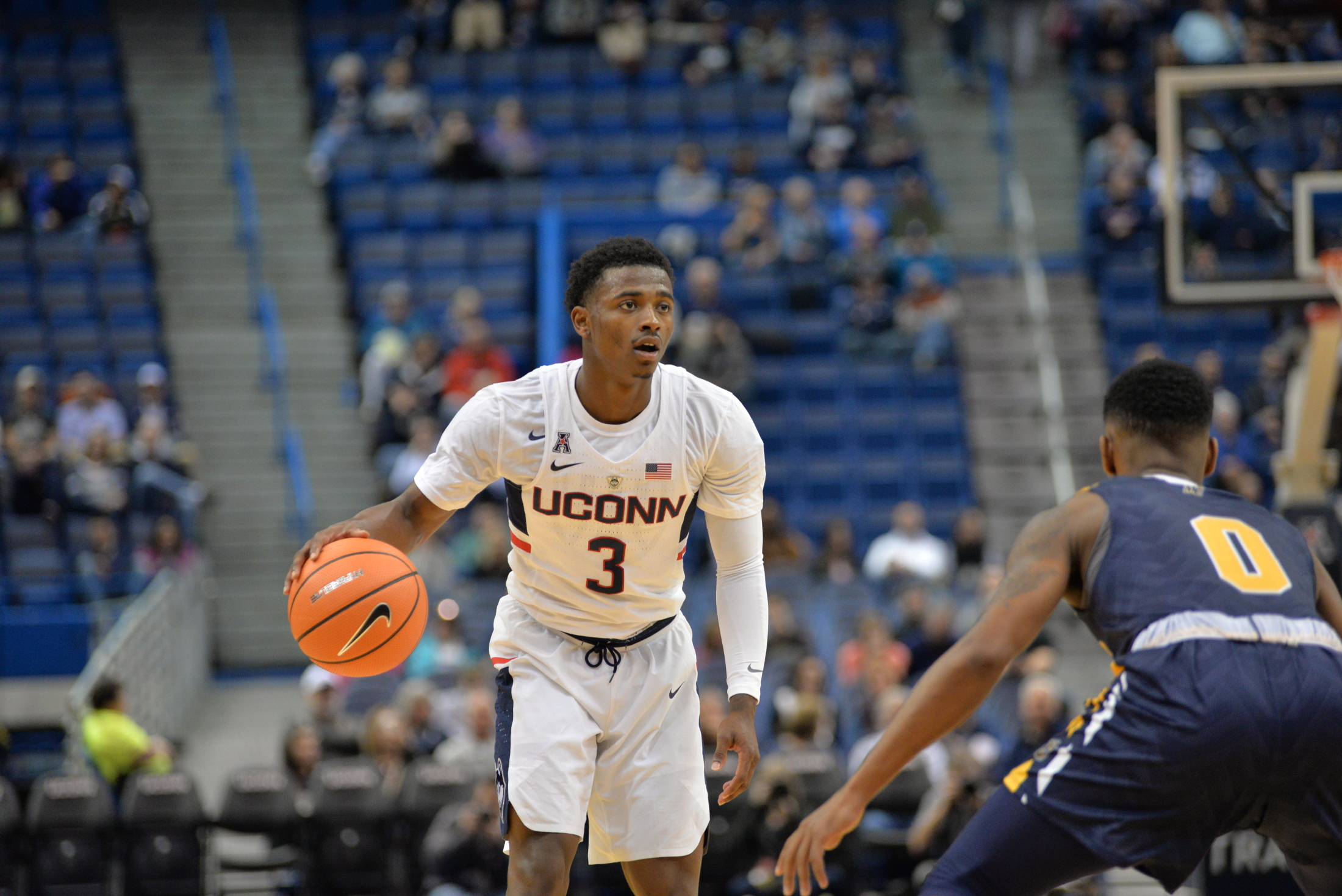 Alterique Gilbert handles the ball in a game last season. He will start at point guard for UConn (File Photo/The Daily Campus)