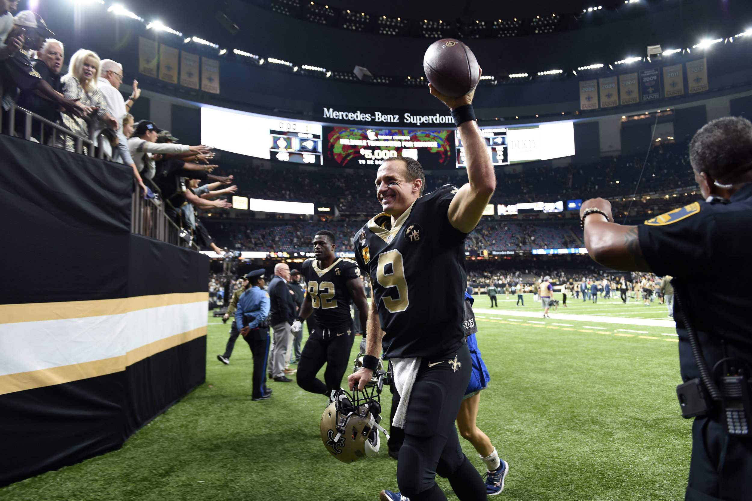 New Orleans Saints quarterback Drew Brees (9) reacts to fans after an NFL football game against the Los Angeles Rams in New Orleans. The Saints won 45-35. (AP Photo/Bill Feig)