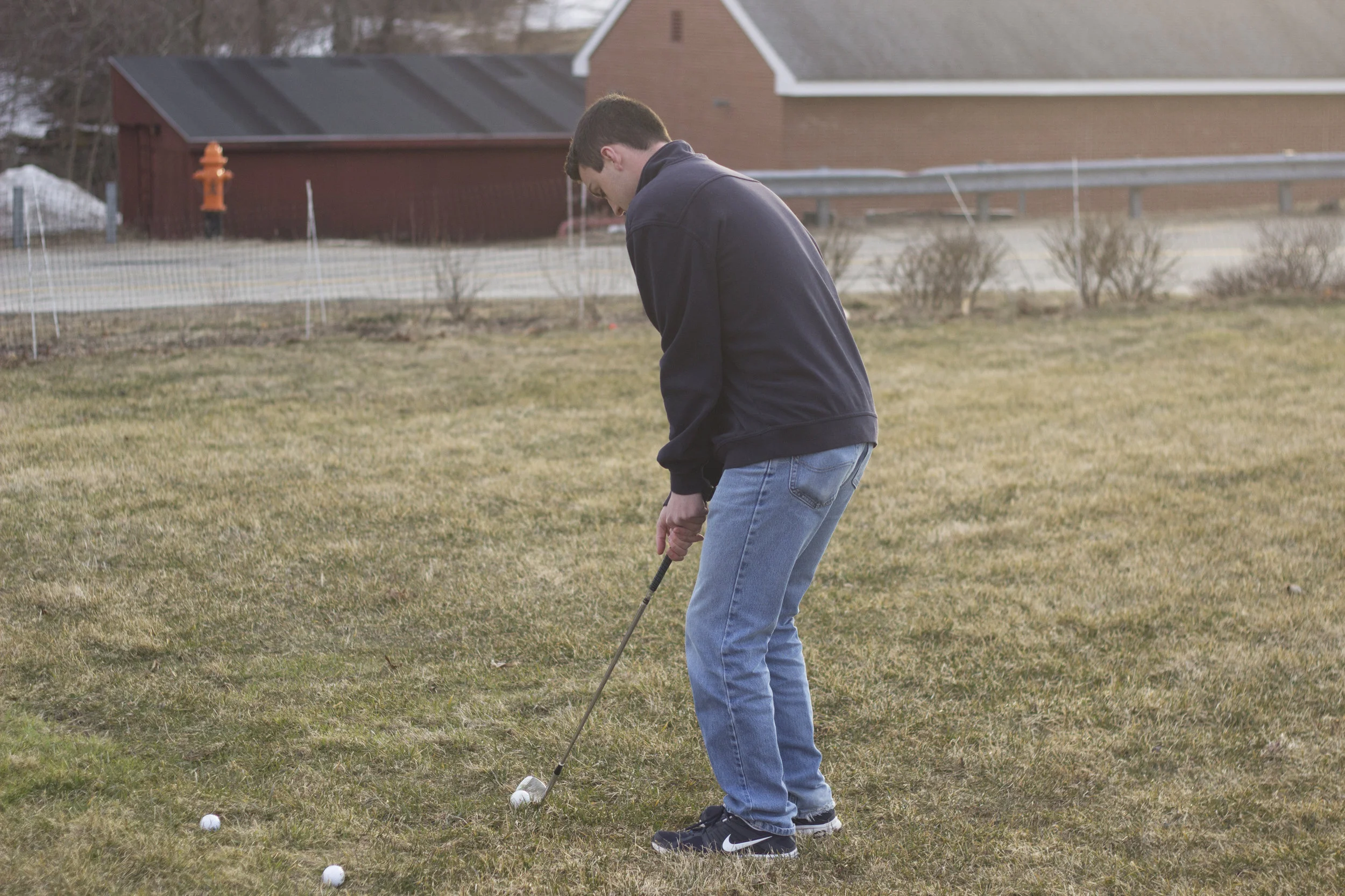 A member of the UConn golf team practices his shot. (File Photo/The Daily Campus)