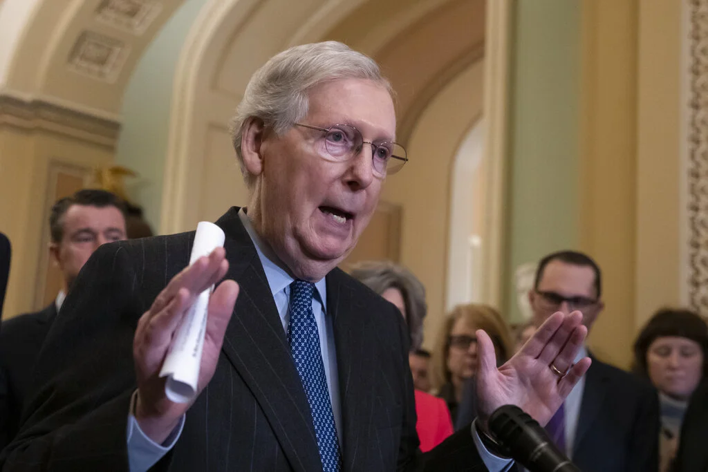Senate Majority Leader Mitch McConnell, R-Ky., speaks to reporters asking about the threat of another government shutdown following their weekly strategy meeting, at the Capitol in Washington, Tuesday, Jan. 29, 2019. With the government funded for three weeks, it's up to a group of House and Senate negotiators to avoid another closure. (AP Photo/J. Scott Applewhite)