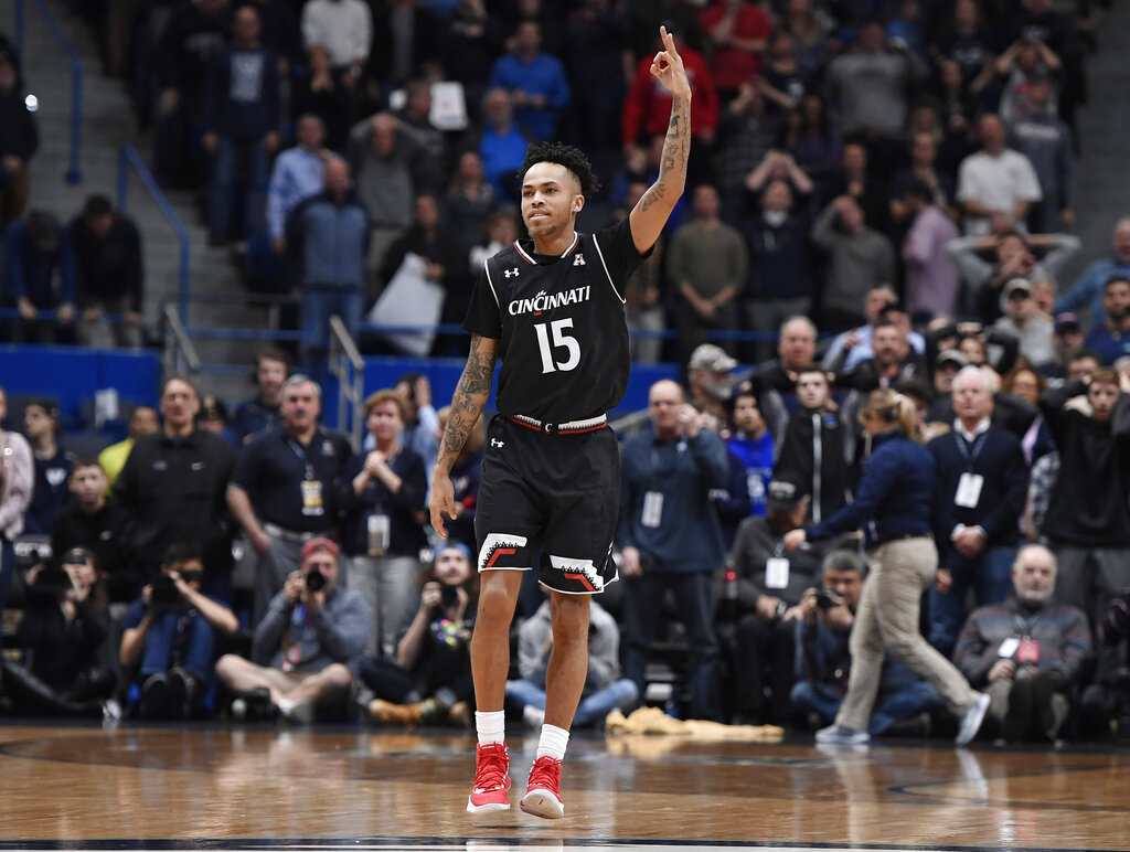 Cincinnati's Cane Broome reacts after making a three-point basket in the final seconds of an NCAA college basketball game against Connecticut, Sunday, Feb. 24, 2019, in Hartford, Conn. (AP Photo/Jessica Hill)