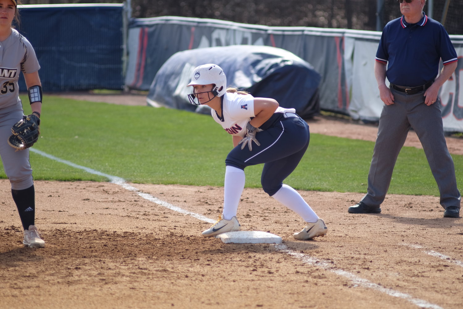 Junior Carli Cutler stands on first base during a home game at Burrill Family Field. (Nicholas Hampton/The Daily Campus)