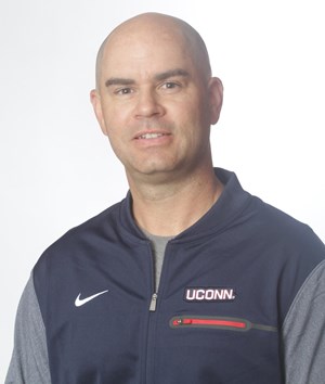 Caddy heads up the Huskies’ defensive unit and player development programs, where he has cultivated multiple All-Americans and Big East Defensive Players of the Year. (Image via UConn Athletics)