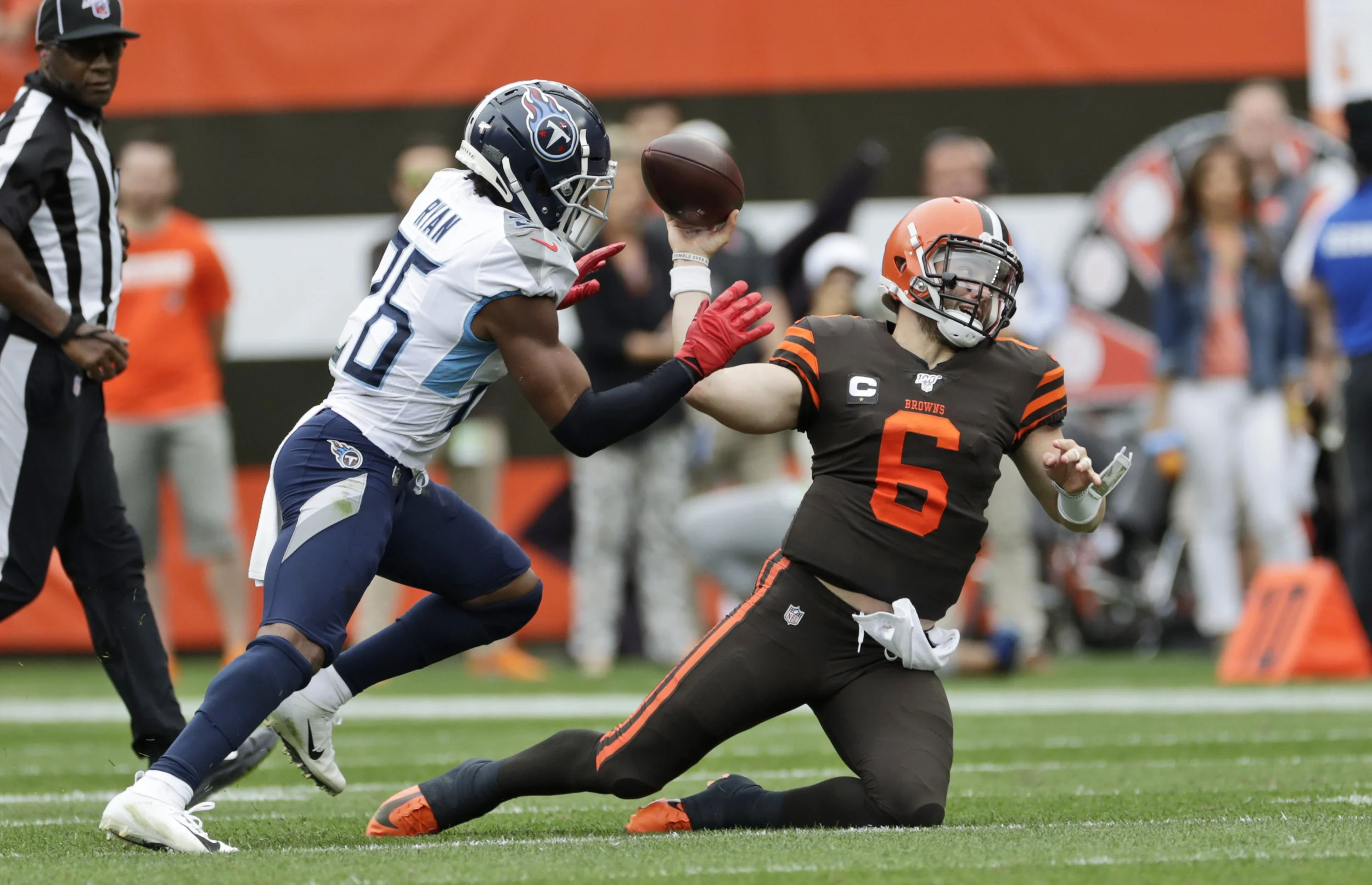 Despite the incredibly high expectations for his sophomore season, Baker Mayfield struggled mightily, throwing three interceptions in the Browns huge loss to the Titans. Photo by The Associated Press.