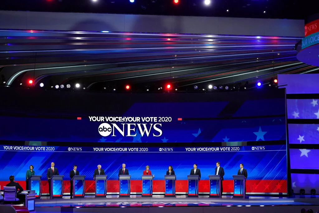 Pictured is the Democratic presidential debate candidates in Houston. The appeasement of a ruthlessly progressive primary constituency is proving more alluring than the desire to improve the country by proposing practical solutions, the intended and unintended consequences of which have been thoroughly considered. Photo by David J. Phillip/AP