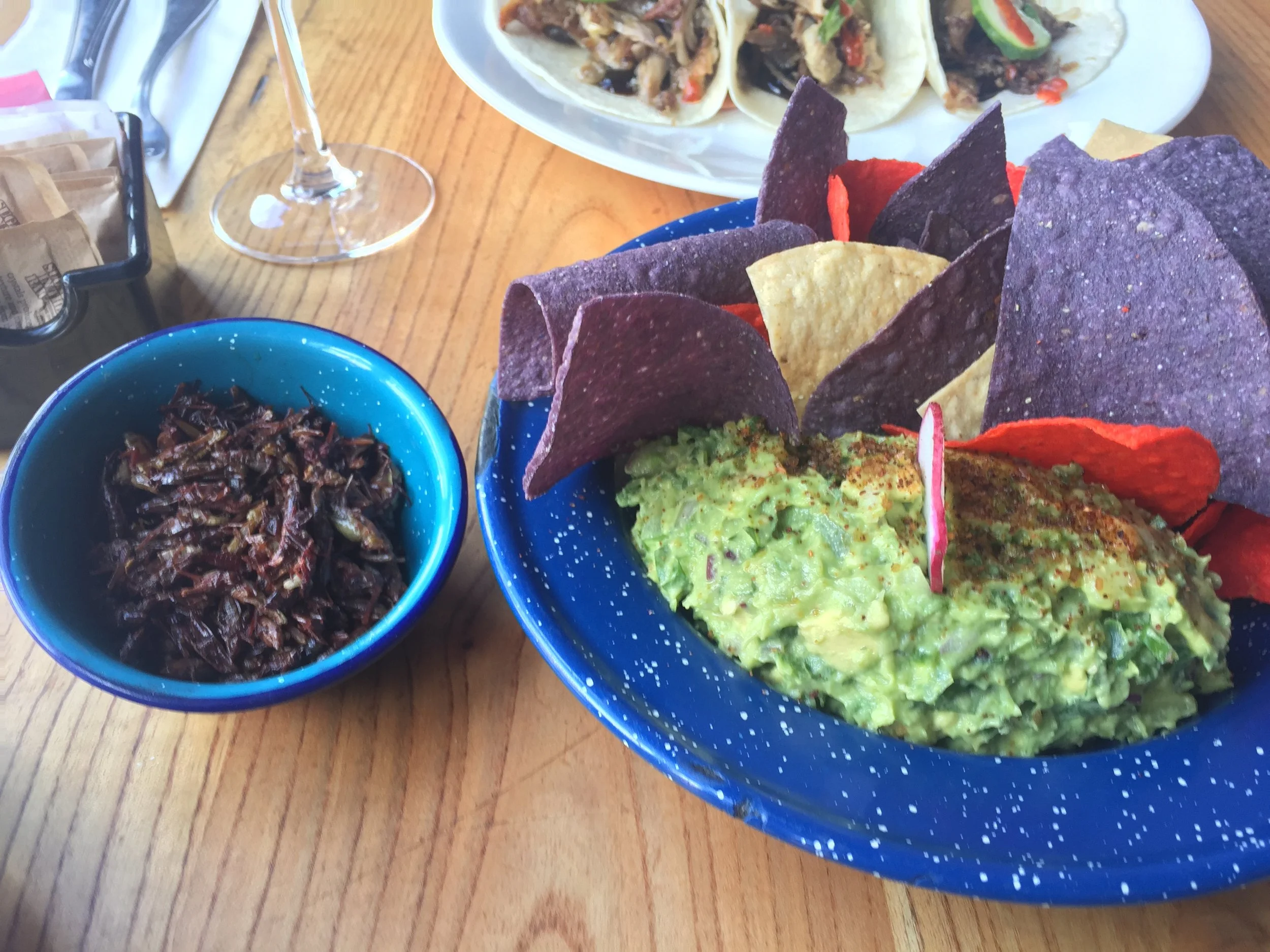 Guacamole with a side of sautéed grasshoppers