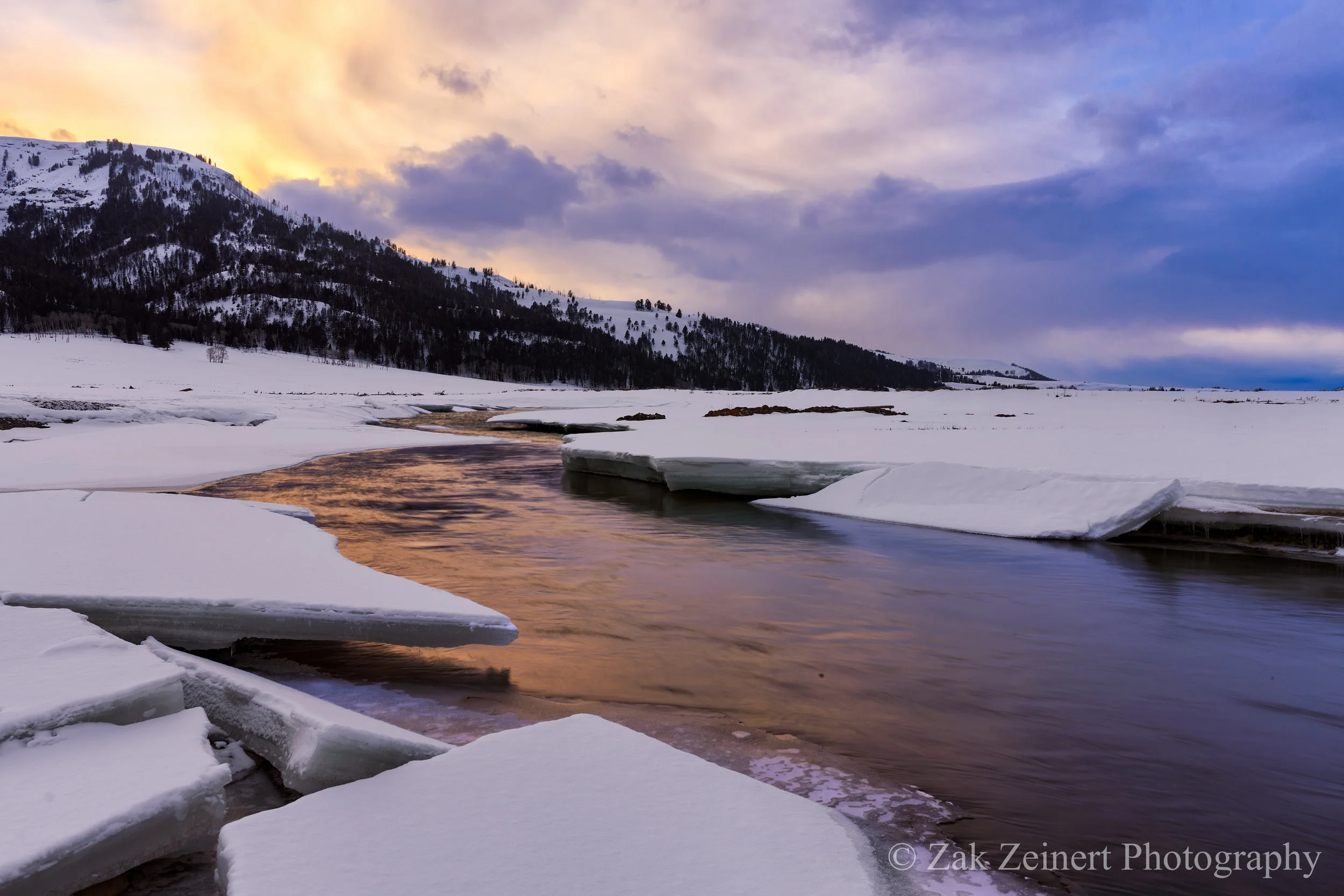 Sunset at Yellowstone, had to stand on ice to get this shot