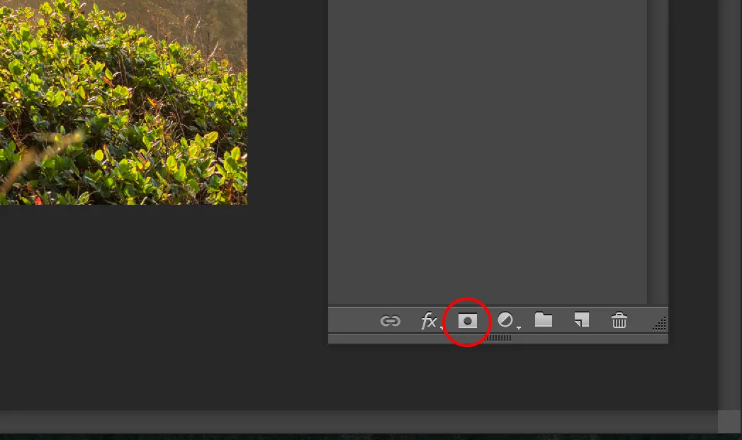 ABOVE - The Layer Mask button (circled) at the bottom of your layers panel. RIGHT - The layer's panel with a layer mask (circled) applied to the starburst layer